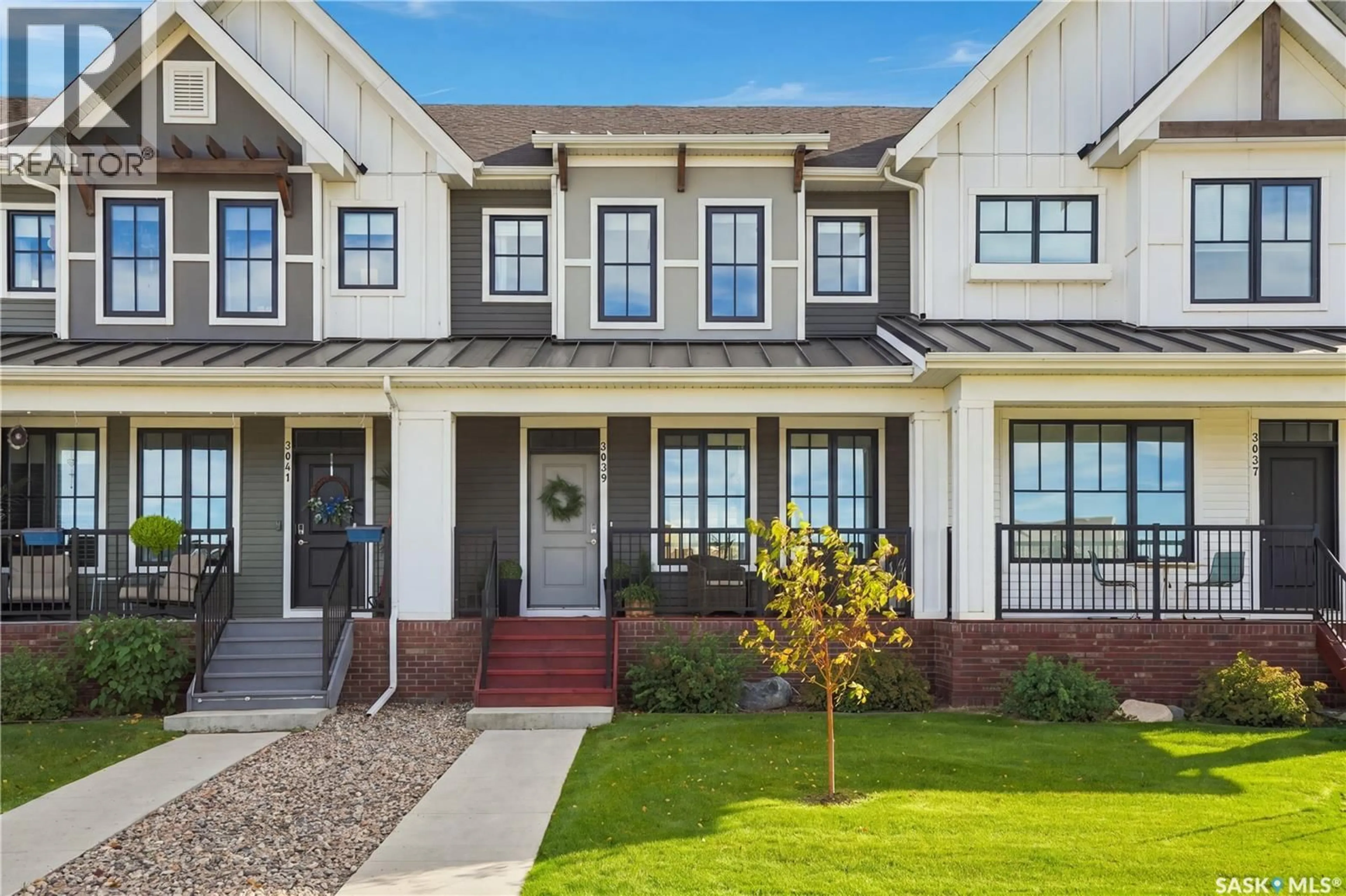 Home with vinyl exterior material, street for 3039 BRIGHTON COMMON, Saskatoon Saskatchewan S7V0Z5