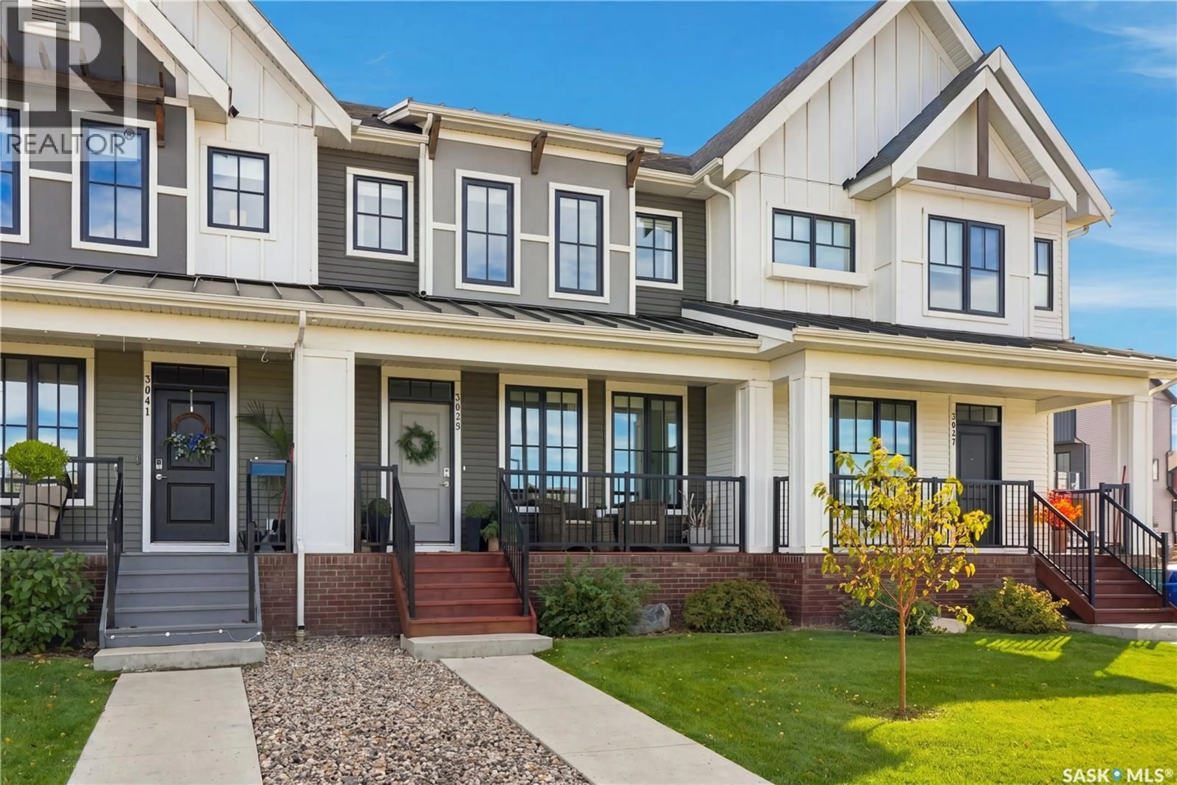 Home with vinyl exterior material, street for 3039 BRIGHTON COMMON, Saskatoon Saskatchewan S7V0Z5