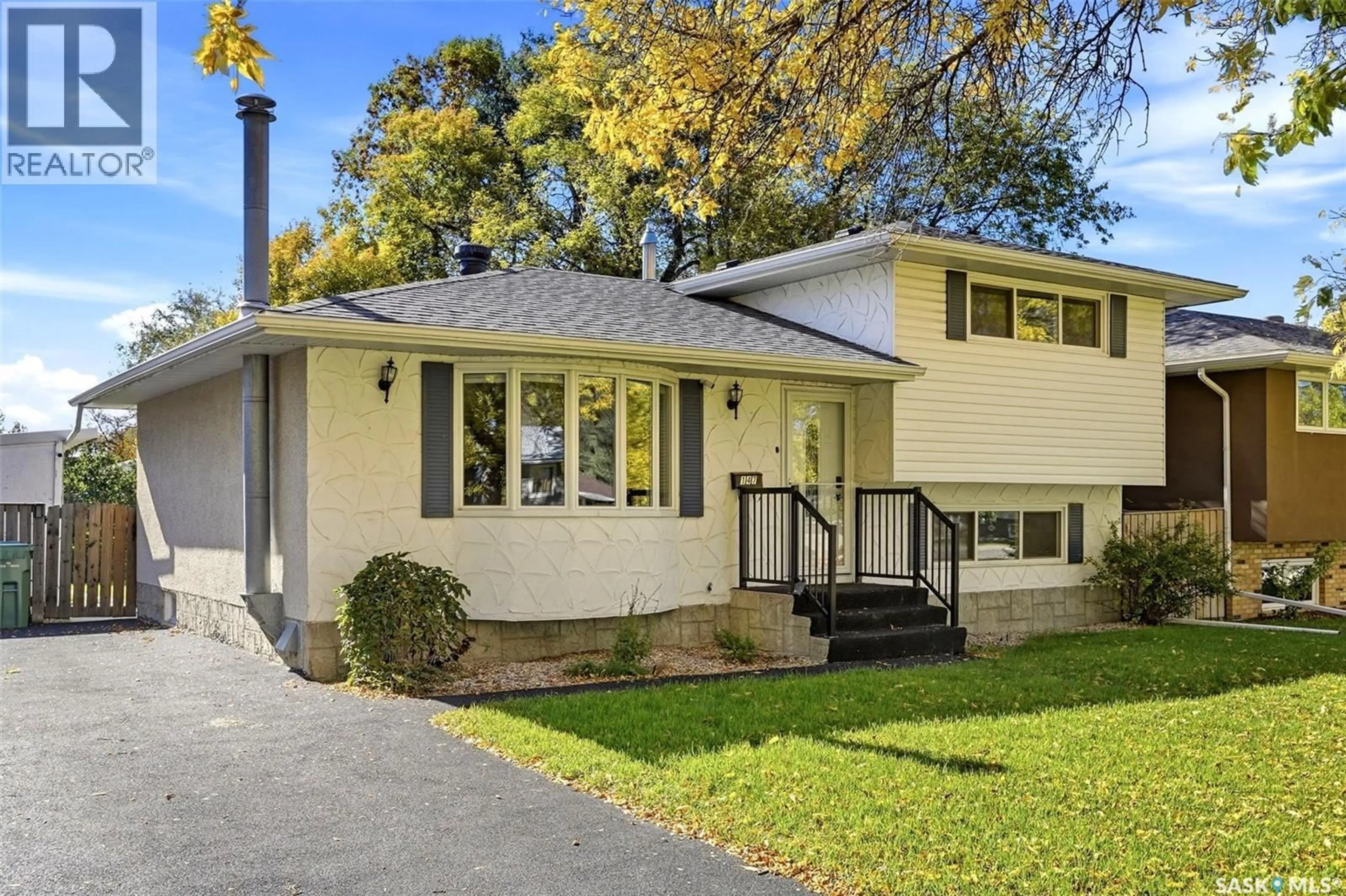 Home with vinyl exterior material, street for 147 RINK AVENUE, Regina Saskatchewan S4R5W2