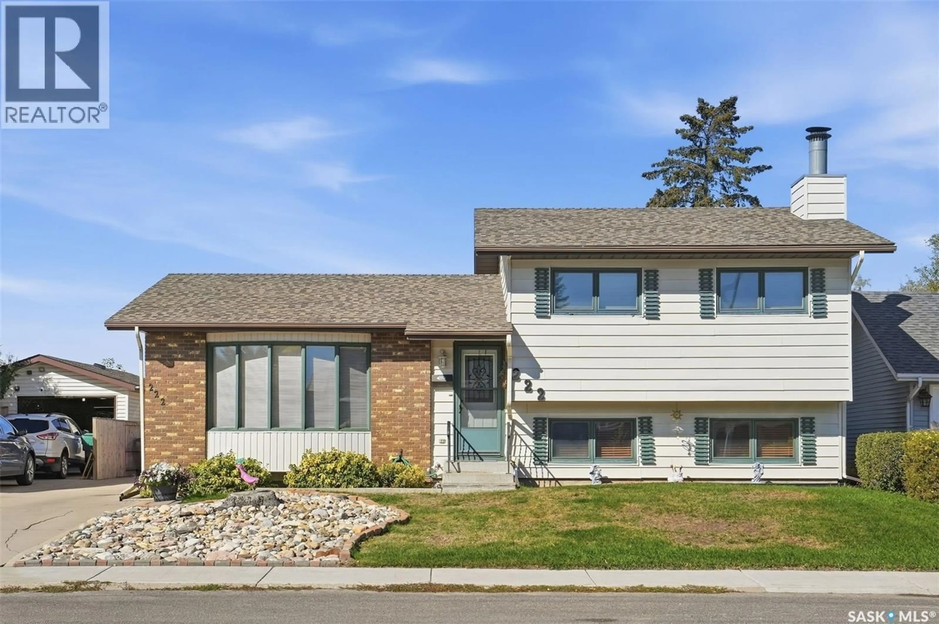Home with brick exterior material, street for 222 MEILICKE ROAD, Saskatoon Saskatchewan S7K6R1