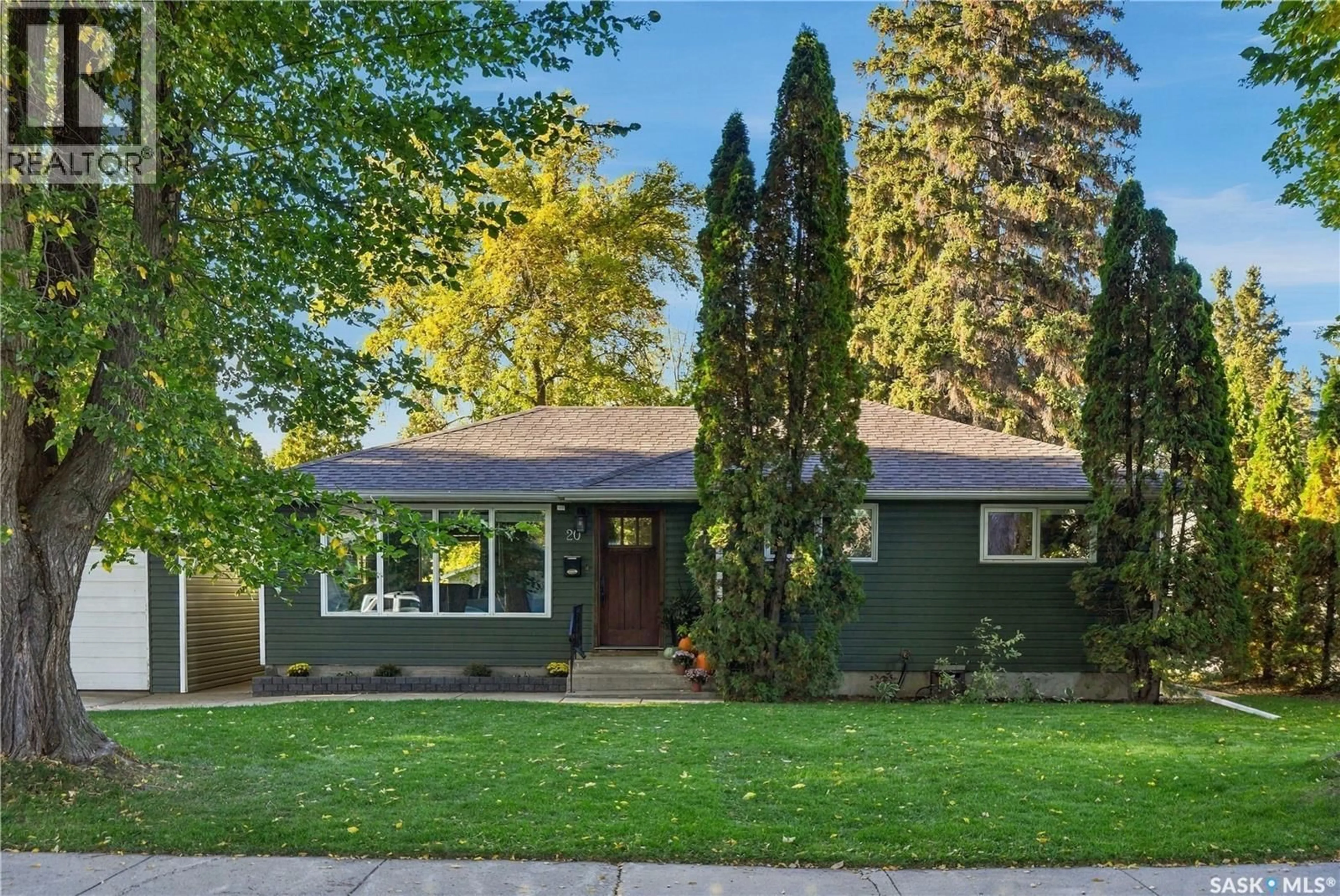 Home with vinyl exterior material, street for 20 PINDER CRESCENT, Saskatoon Saskatchewan S7J2K8