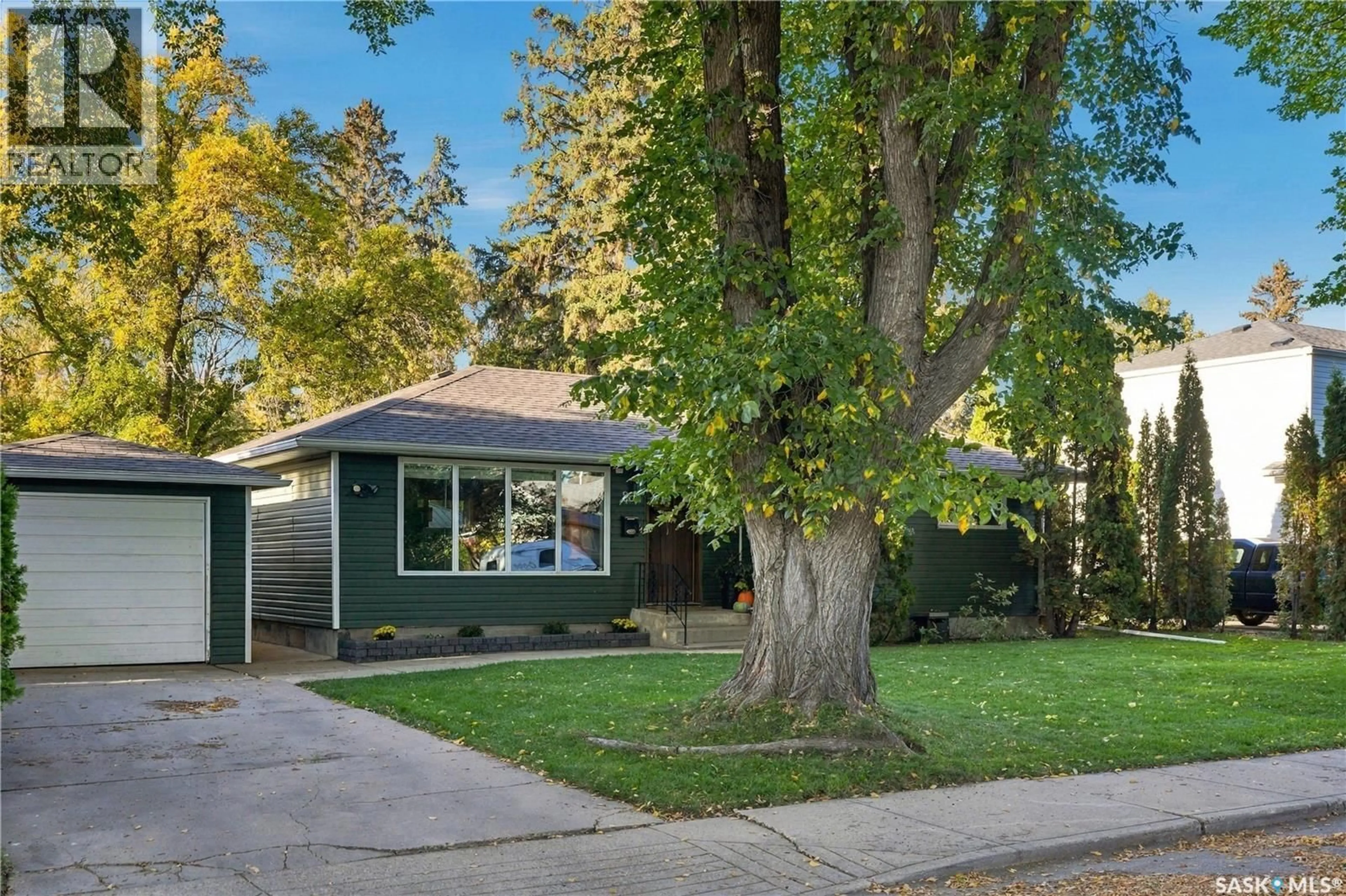 Home with vinyl exterior material, street for 20 PINDER CRESCENT, Saskatoon Saskatchewan S7J2K8