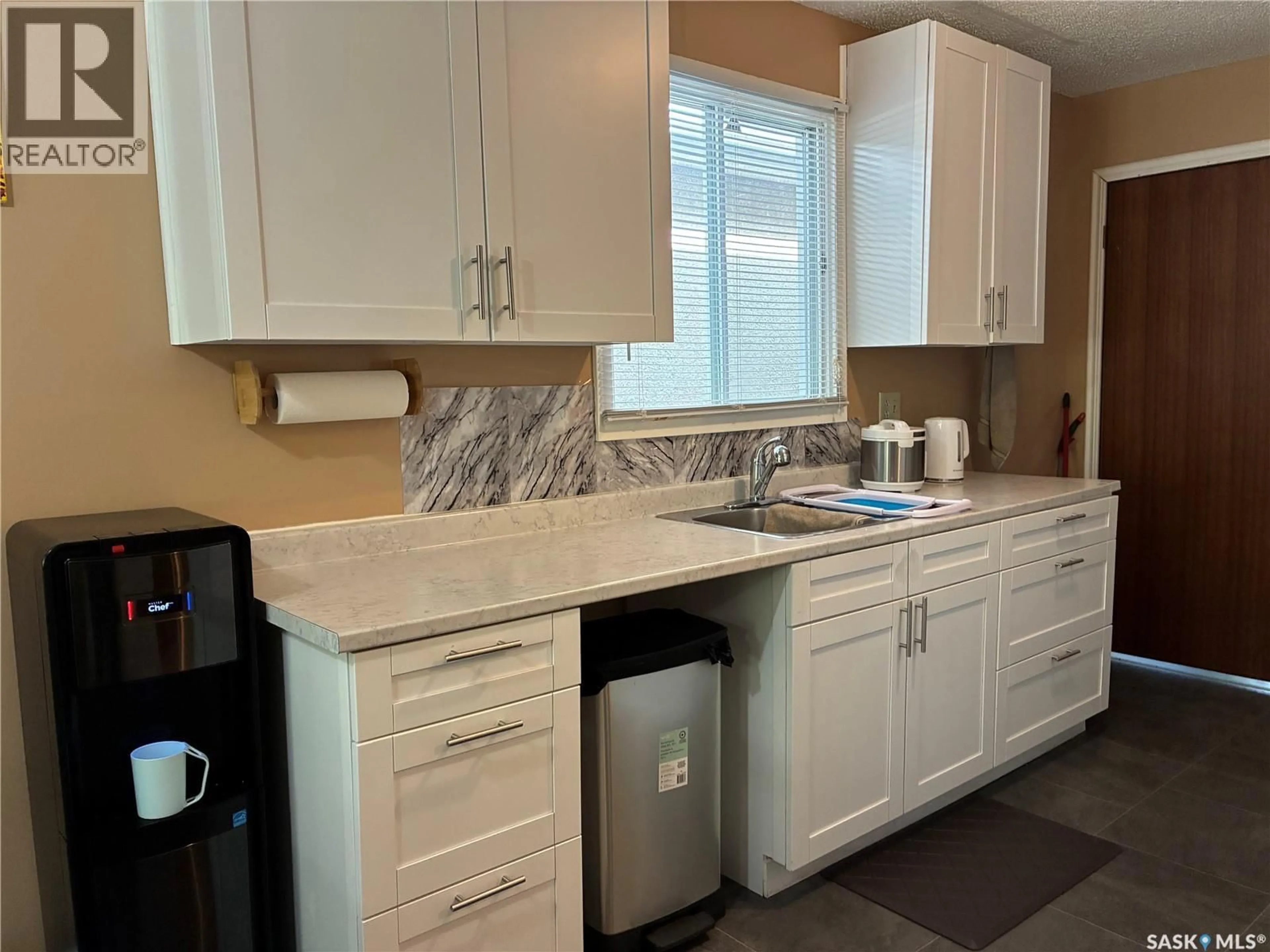 Standard kitchen, ceramic/tile floor for 1055 CAMERON STREET, Regina Saskatchewan S4V1A8