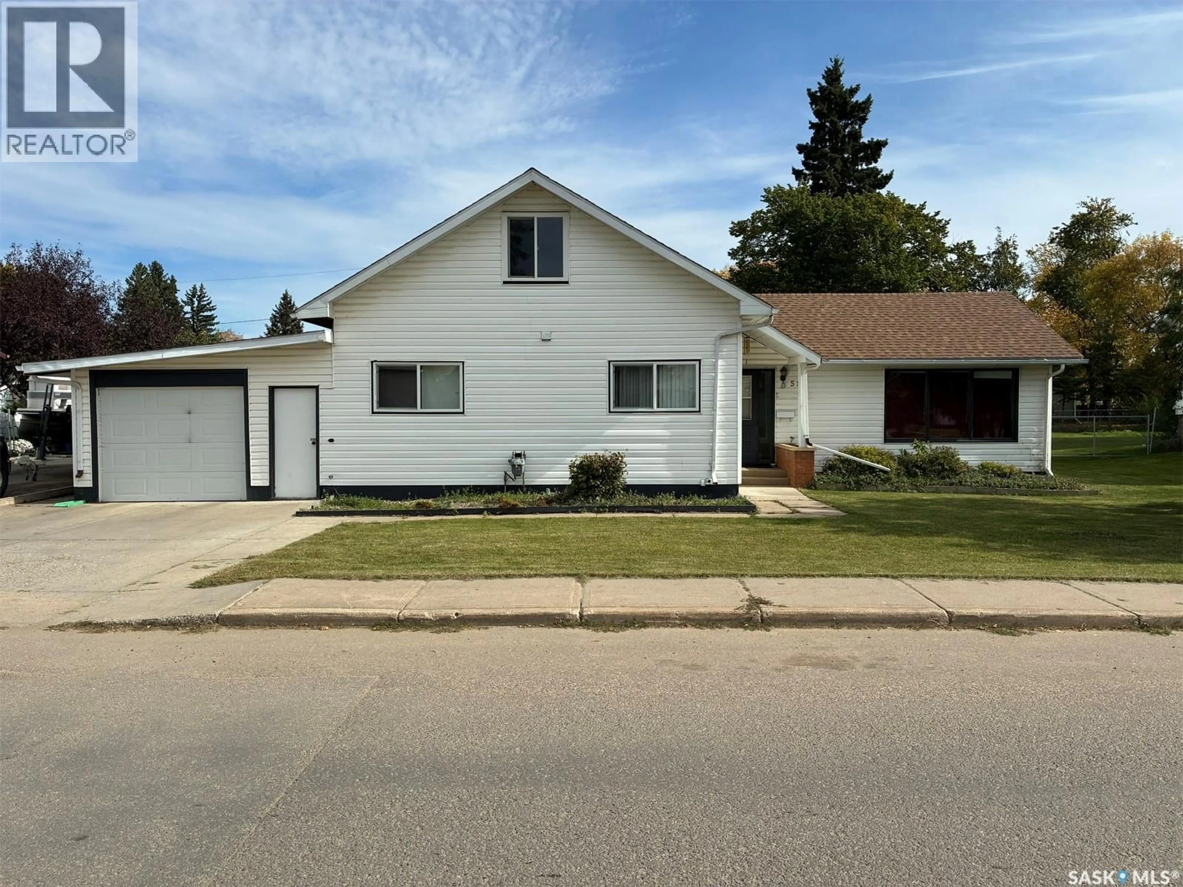 Home with vinyl exterior material, street for 510 CENTRE STREET, Meadow Lake Saskatchewan S9X1E9