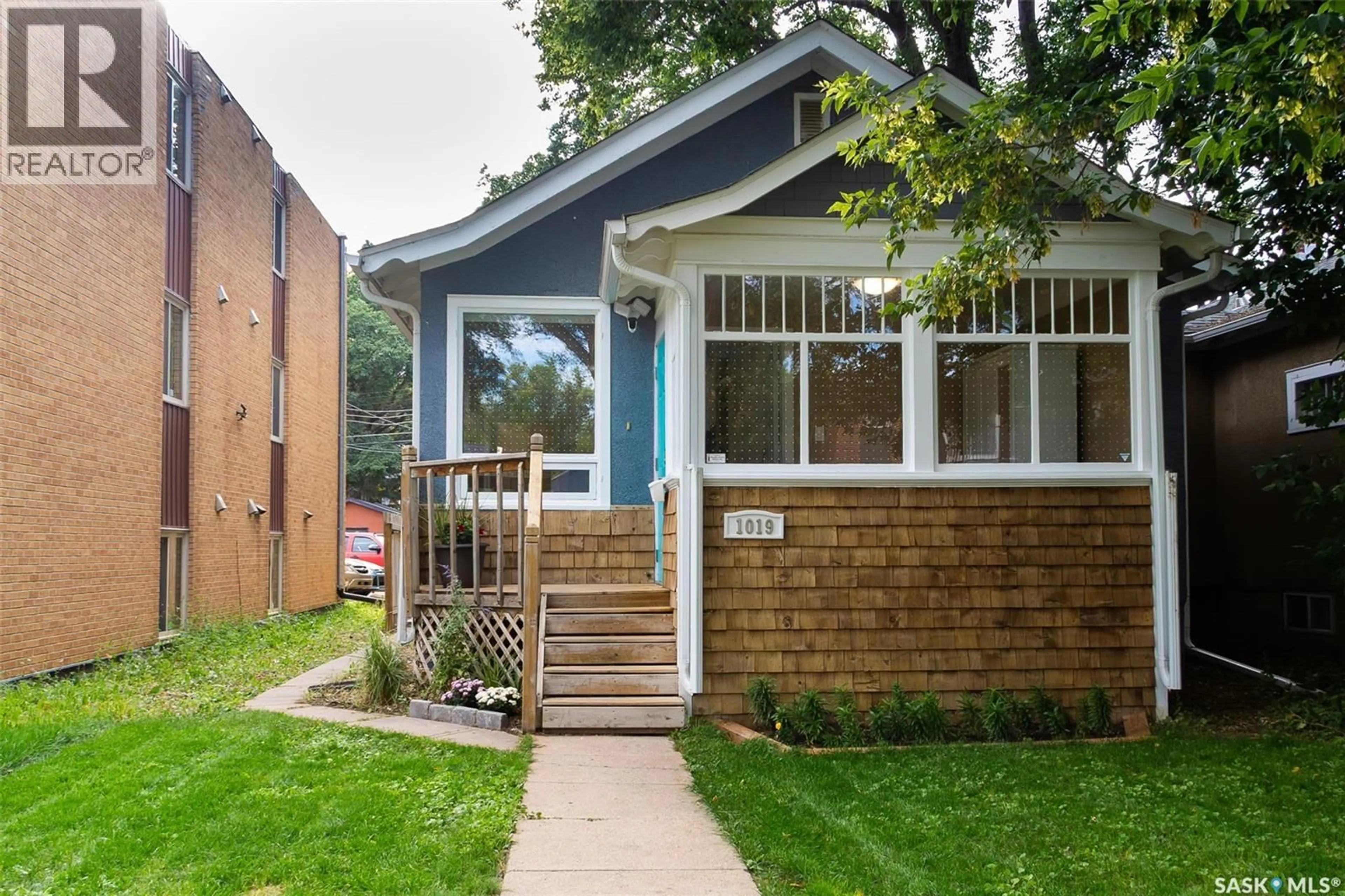 Home with brick exterior material, street for 1019 C AVENUE, Saskatoon Saskatchewan S7L1K1