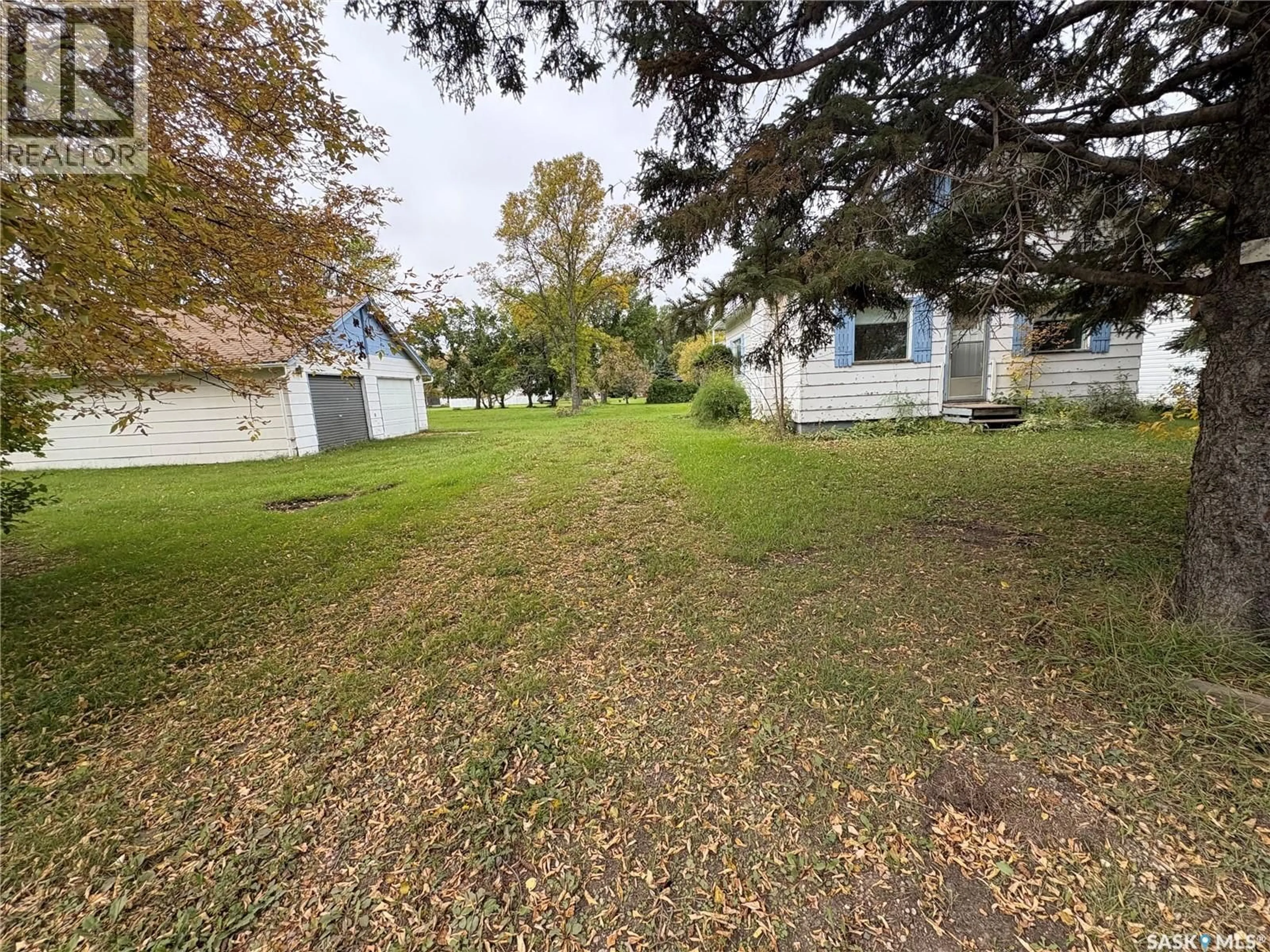A pic from outside/outdoor area/front of a property/back of a property/a pic from drone, street for 302 & 304 LIVINGSTONE ROAD, Pelly Saskatchewan S0A2Z0