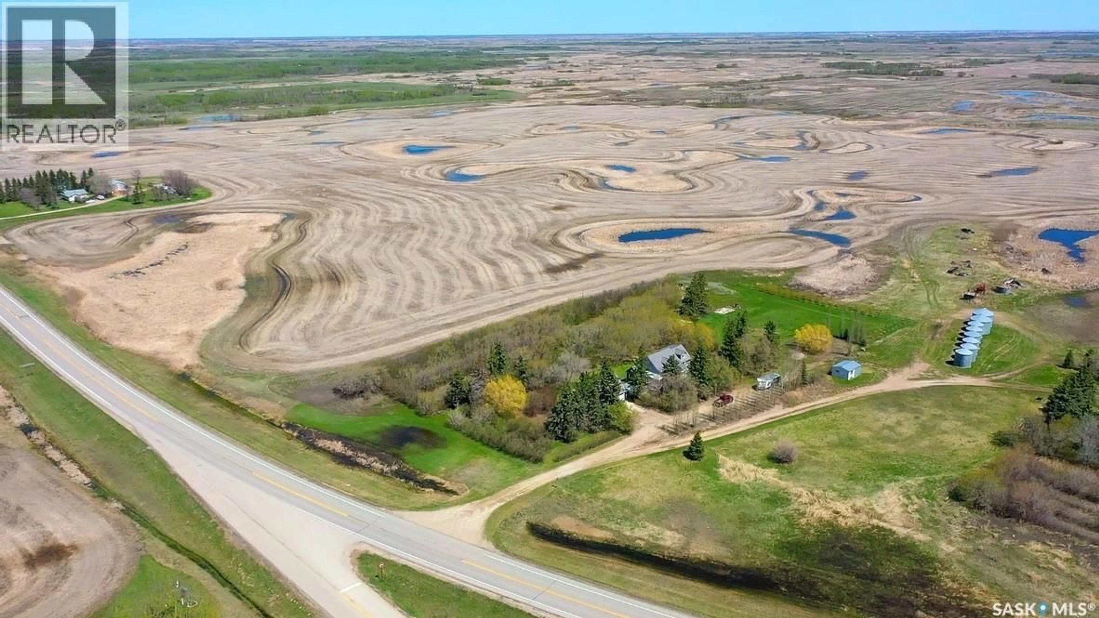 A pic from outside/outdoor area/front of a property/back of a property/a pic from drone, water/lake/river/ocean view for HAWCUTT ACREAGE, Grayson Rm No. 184 Saskatchewan S0A3Y0
