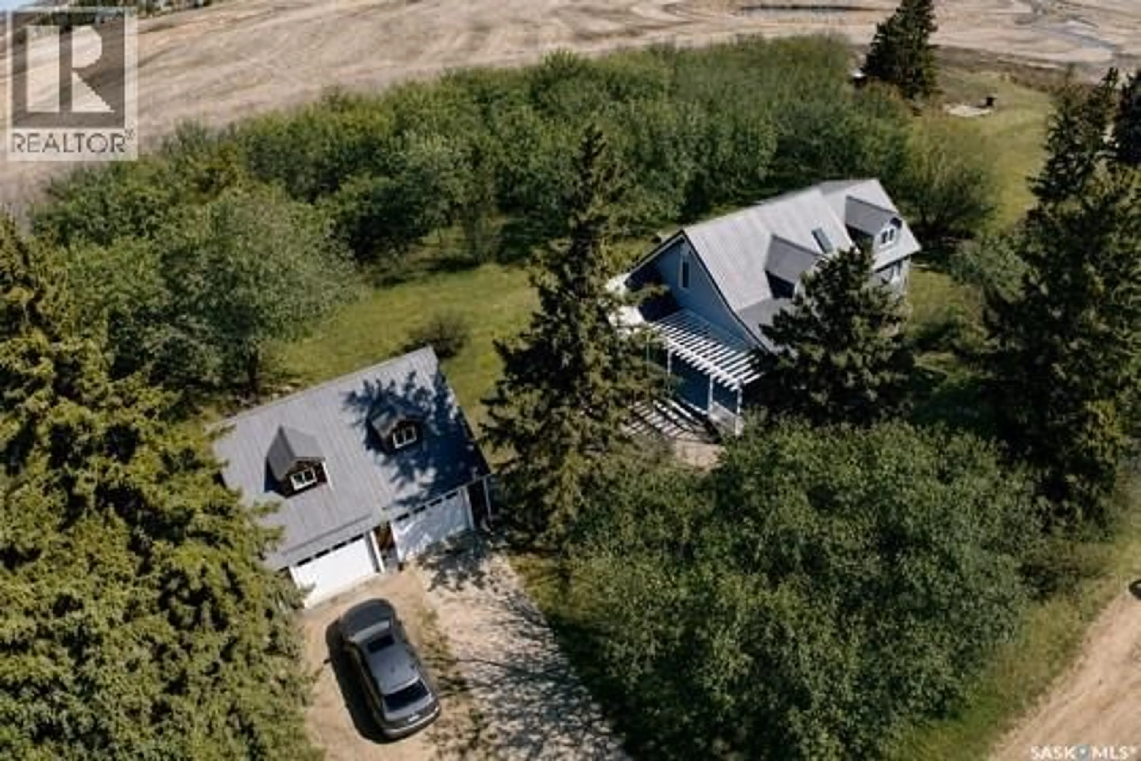 A pic from outside/outdoor area/front of a property/back of a property/a pic from drone, street for HAWCUTT ACREAGE, Grayson Rm No. 184 Saskatchewan S0A3Y0