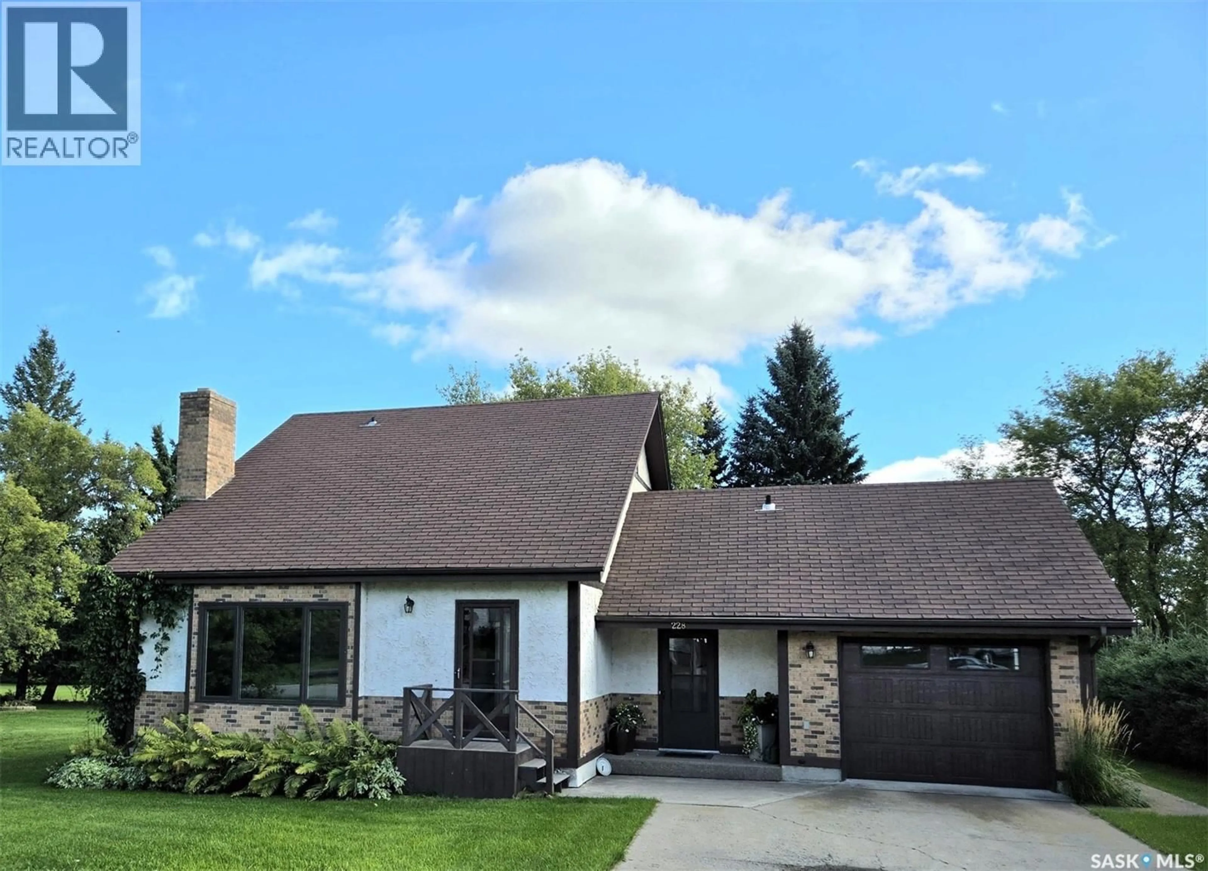 Home with vinyl exterior material, street for 228 RAILWAY AVENUE, Wawota Saskatchewan S0G5A0