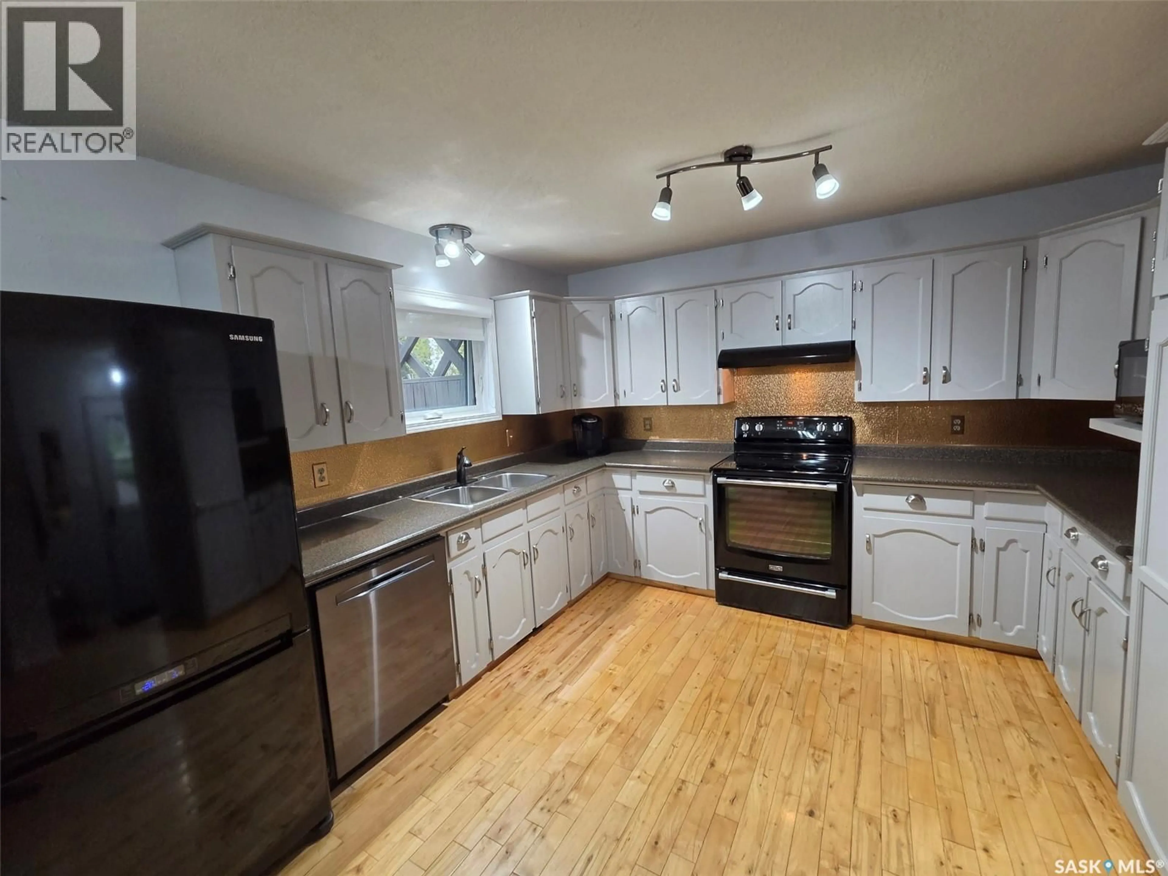 Standard kitchen, wood/laminate floor for 228 RAILWAY AVENUE, Wawota Saskatchewan S0G5A0