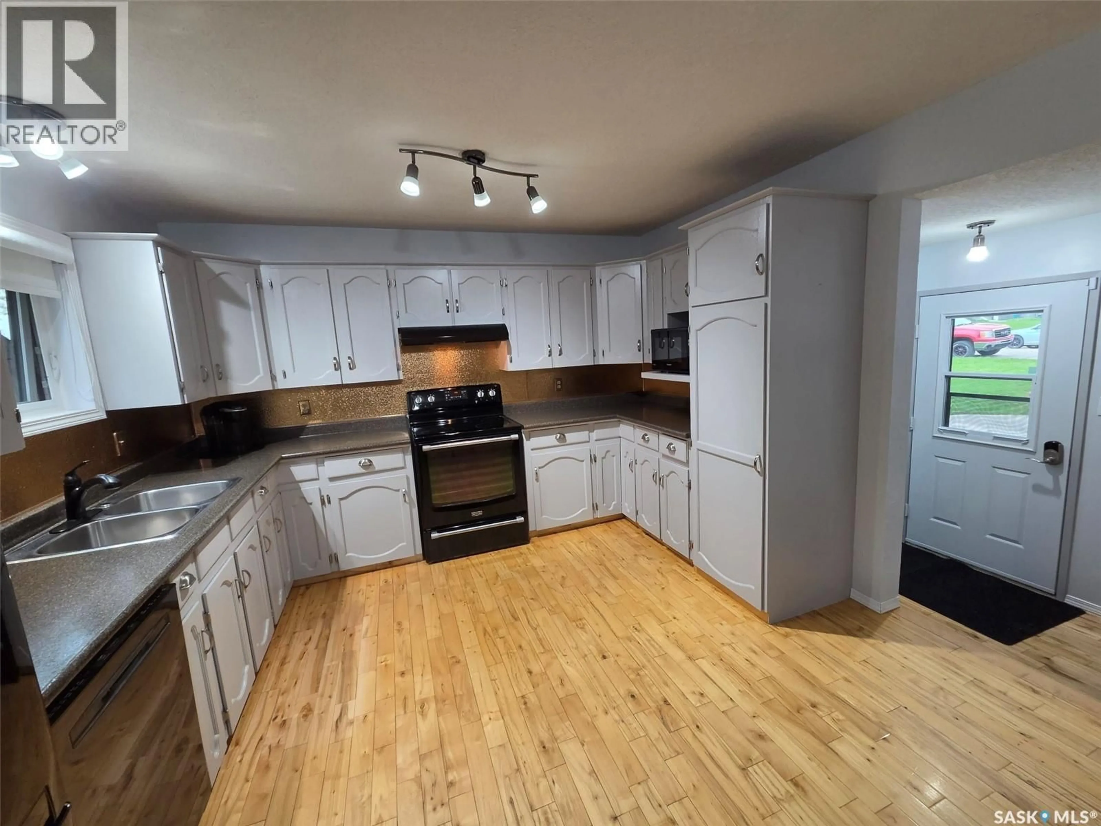Standard kitchen, wood/laminate floor for 228 RAILWAY AVENUE, Wawota Saskatchewan S0G5A0