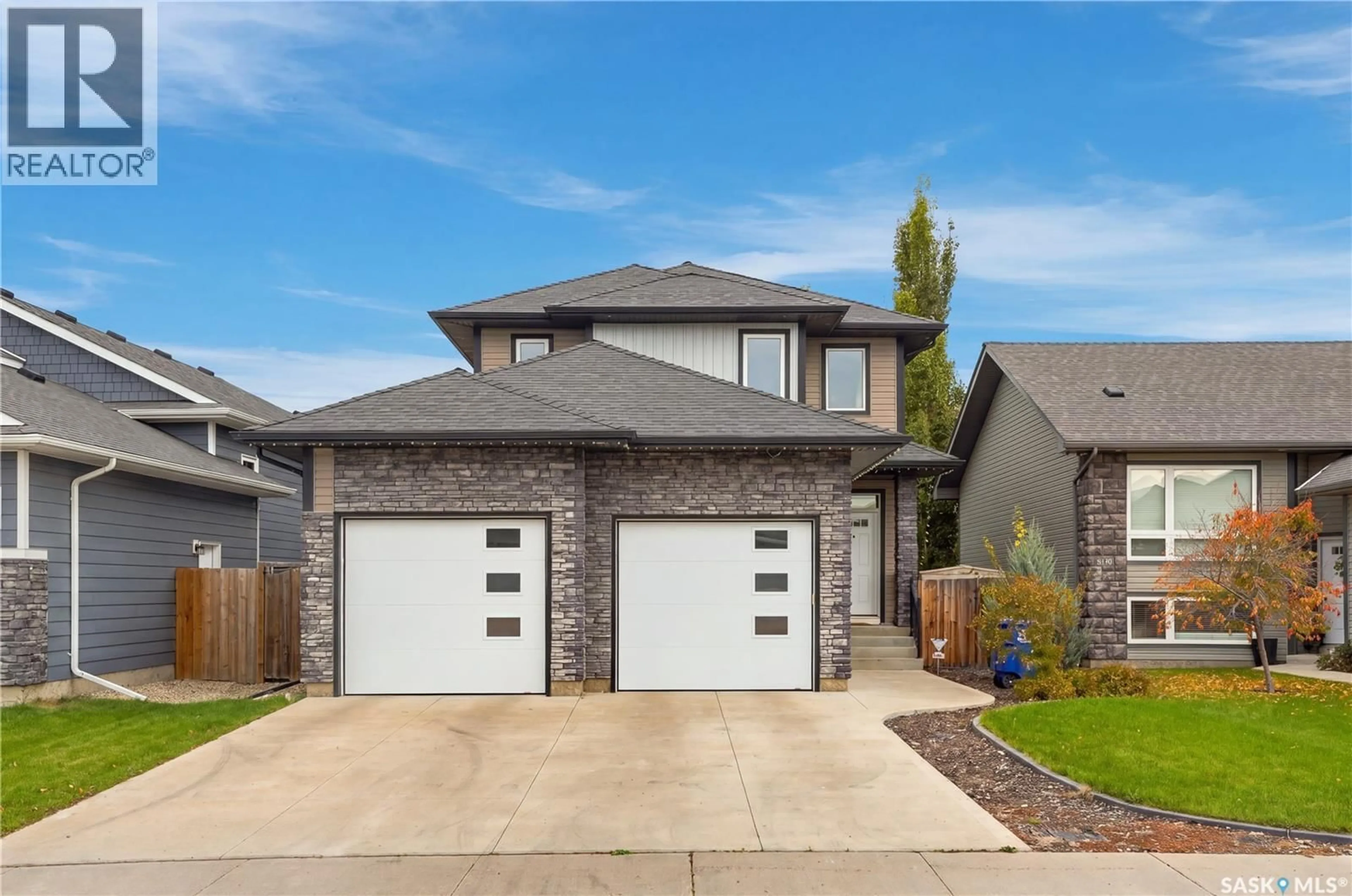 Home with brick exterior material, street for 1415 PRINGLE CRESCENT, Saskatoon Saskatchewan S7T0S6