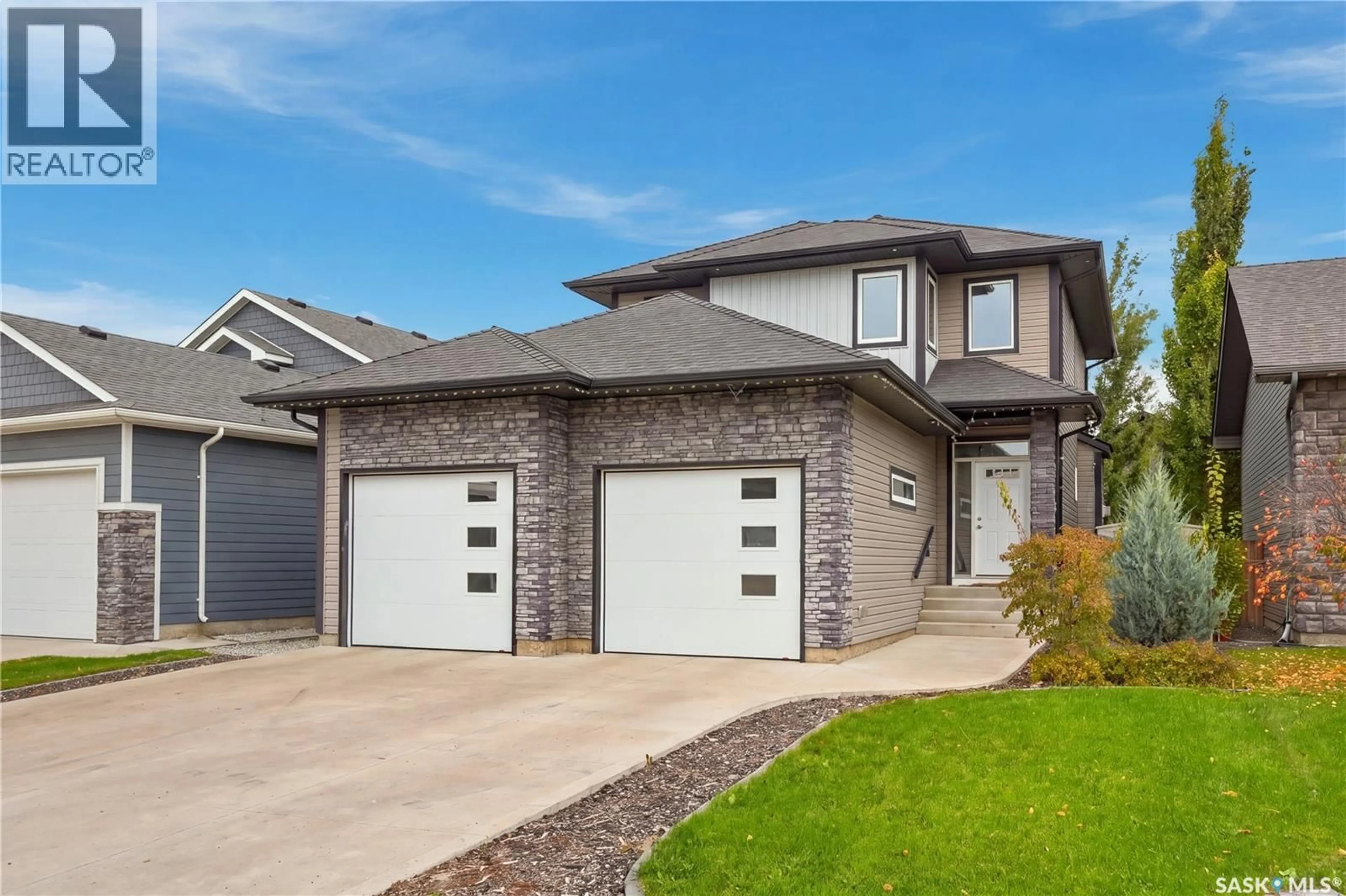 Home with brick exterior material, street for 1415 PRINGLE CRESCENT, Saskatoon Saskatchewan S7T0S6