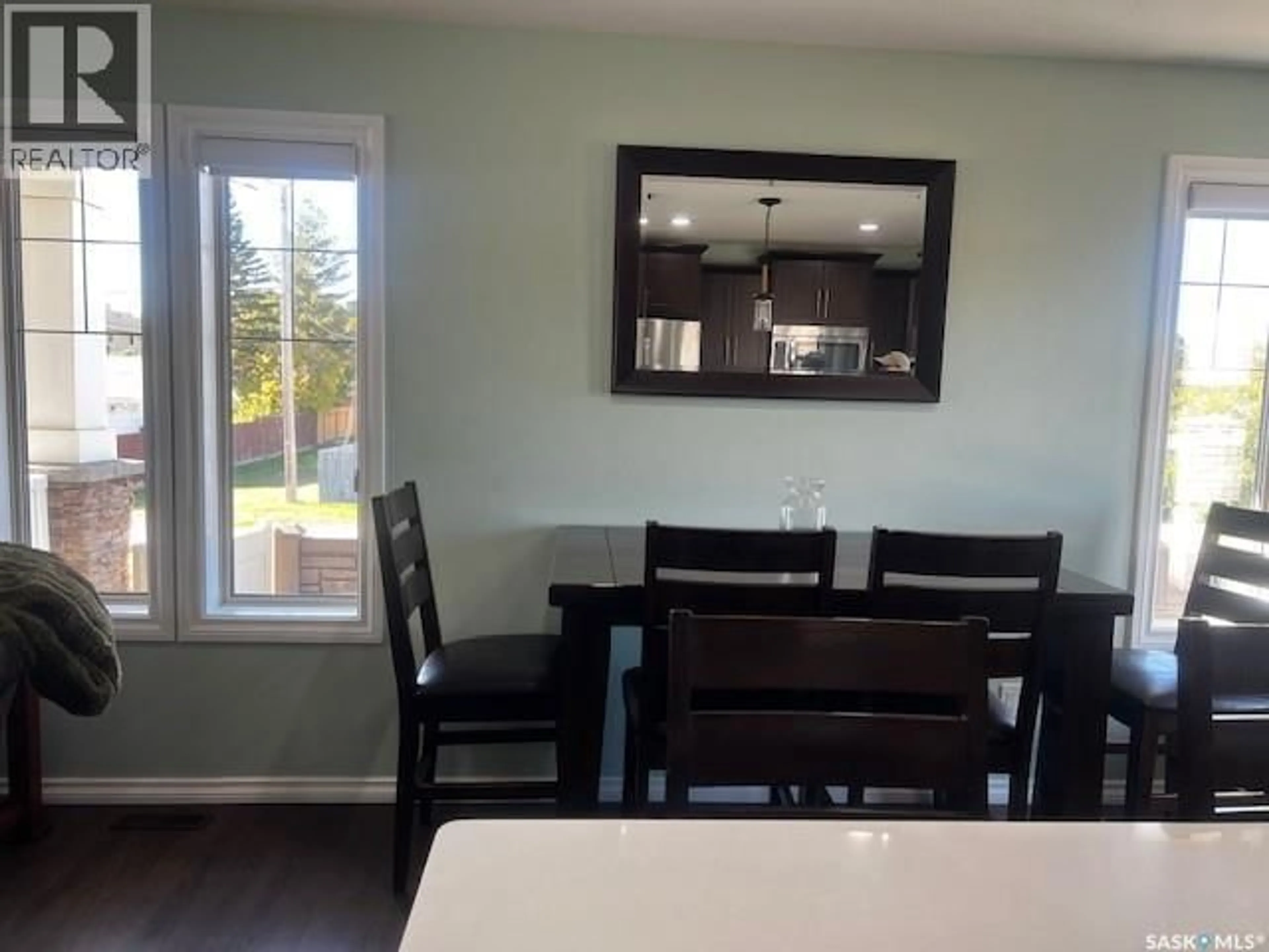 Dining room, wood/laminate floor for 2 MACKENZIE ROAD, Pilot Butte Saskatchewan S0G3Z0
