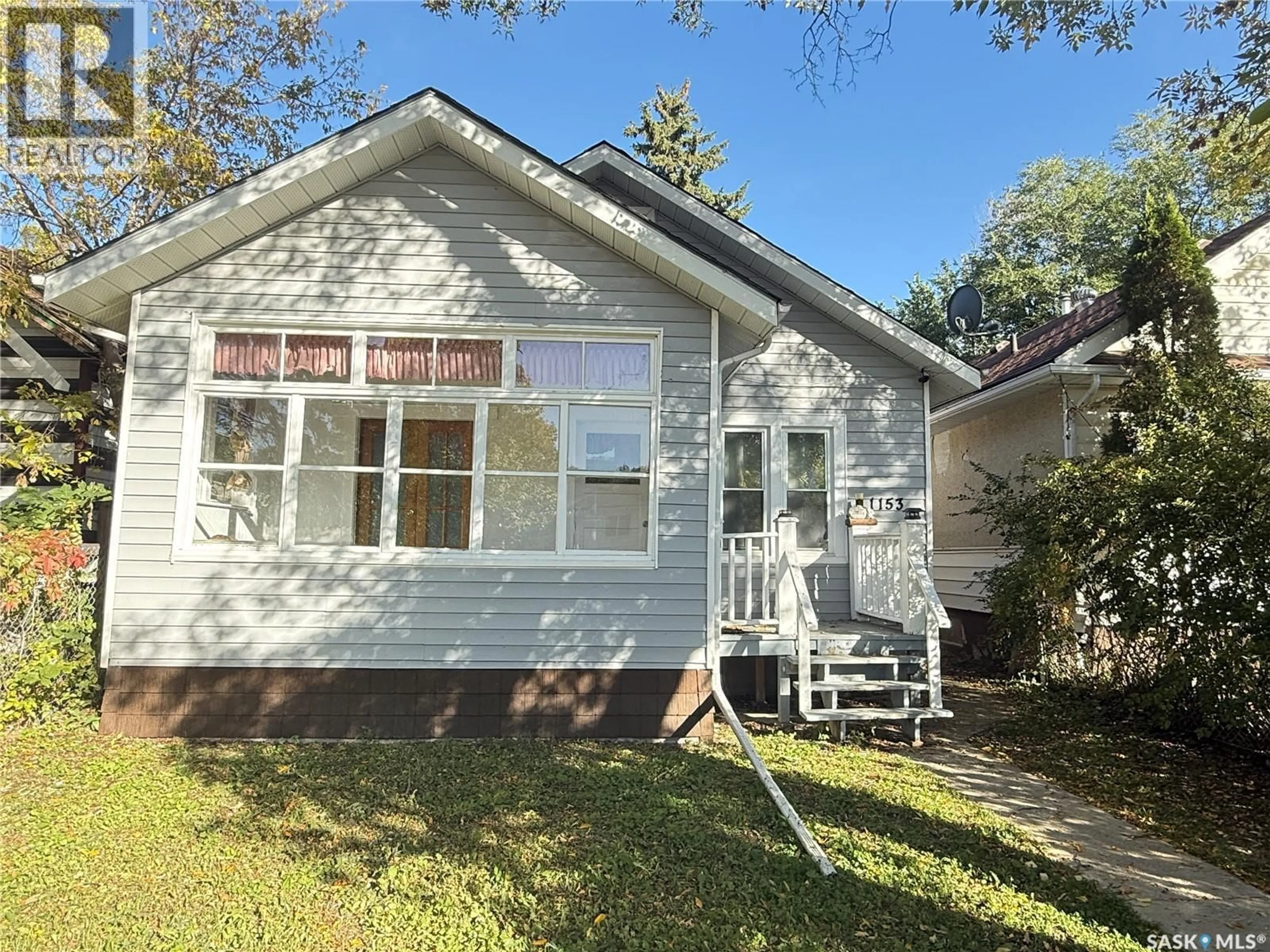 Home with vinyl exterior material, street for 1153 MONTAGUE STREET, Regina Saskatchewan S4T3H8