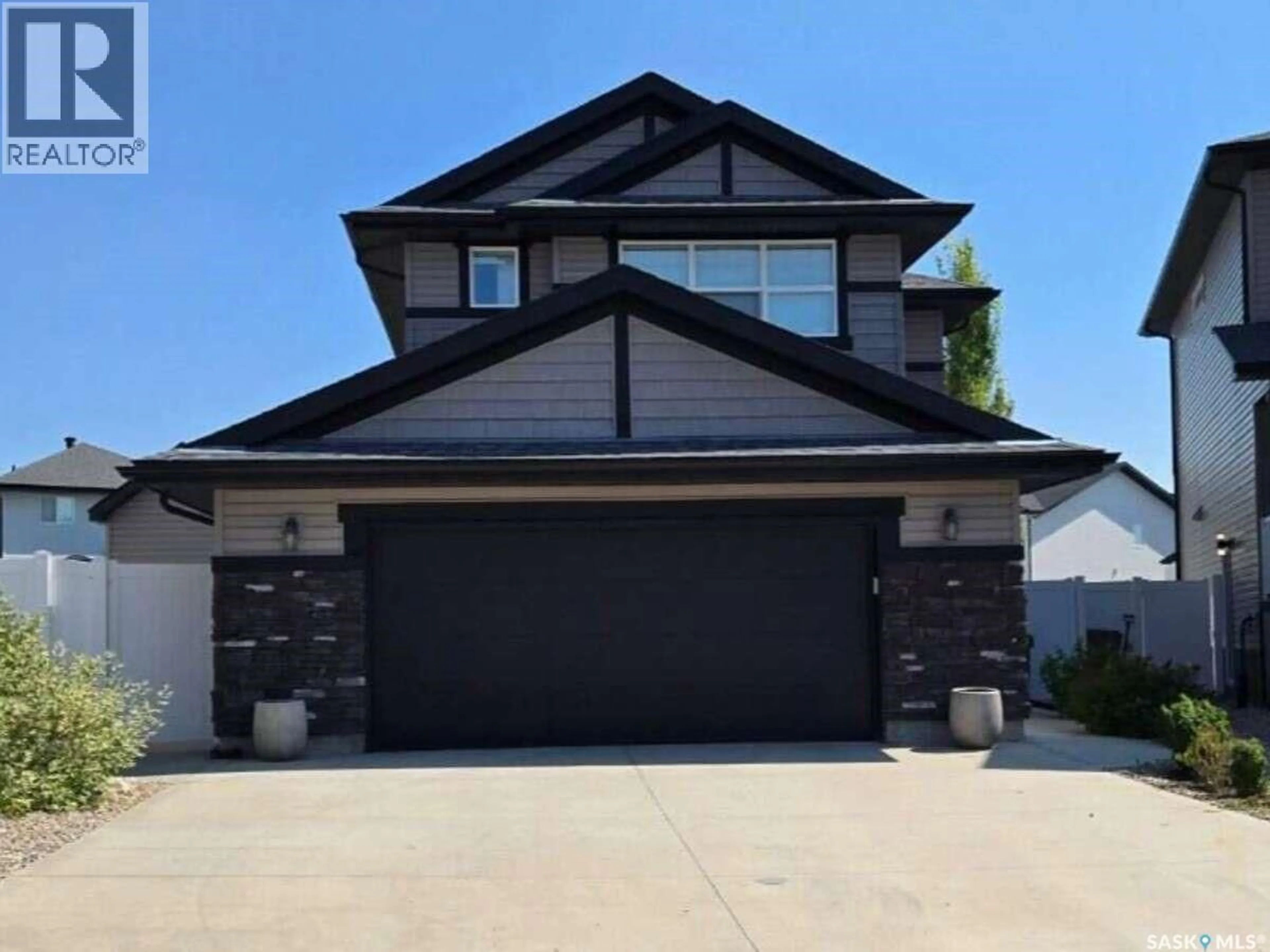 Home with brick exterior material, street for 5432 BOYER BAY, Regina Saskatchewan S4V3P2
