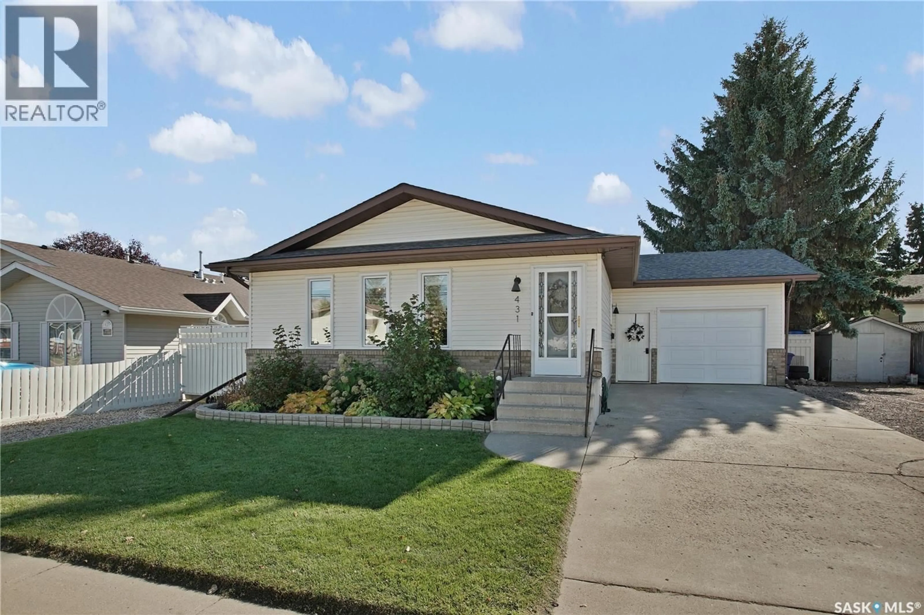 Home with vinyl exterior material, street for 431 PETERS STREET, Warman Saskatchewan S0K4S0
