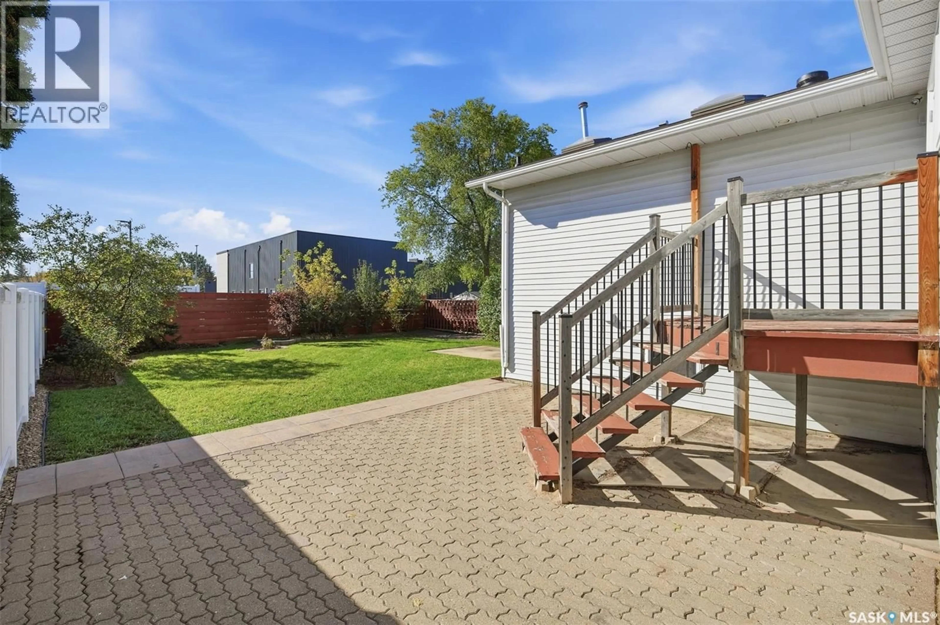 A pic from outside/outdoor area/front of a property/back of a property/a pic from drone, street for 404 PETERS STREET, Warman Saskatchewan S0K4S0