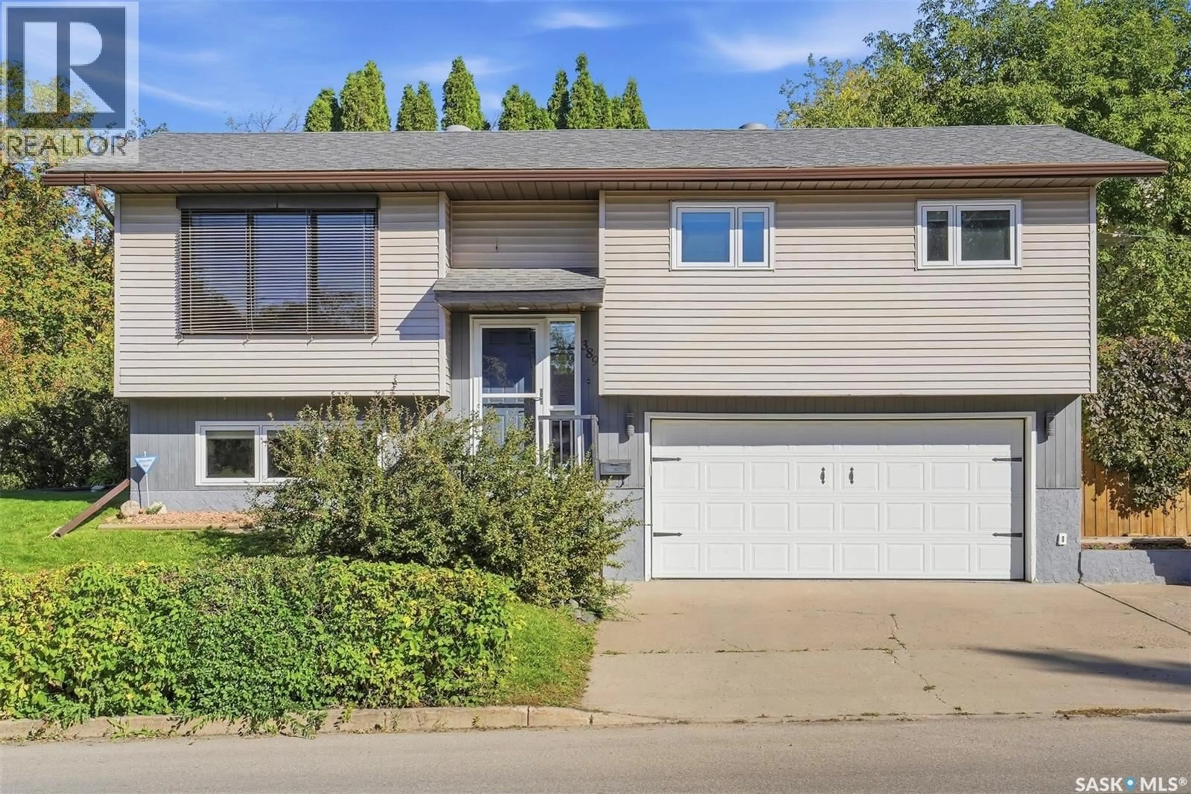 Home with vinyl exterior material, street for 389 21ST STREET, Prince Albert Saskatchewan S6V4J2