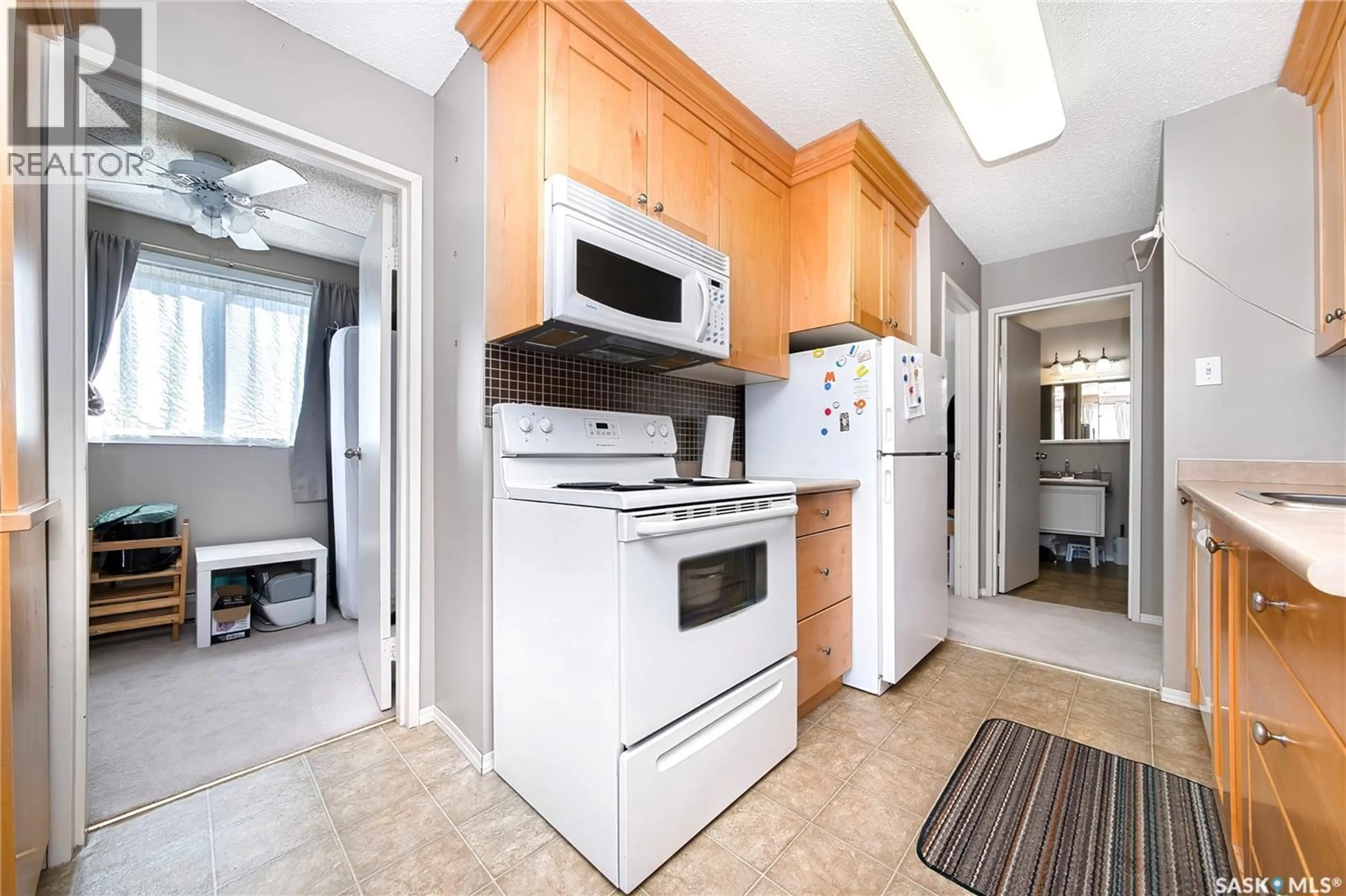 Standard kitchen, ceramic/tile floor for 109 111 WEDGE ROAD, Saskatoon Saskatchewan S7L6S8