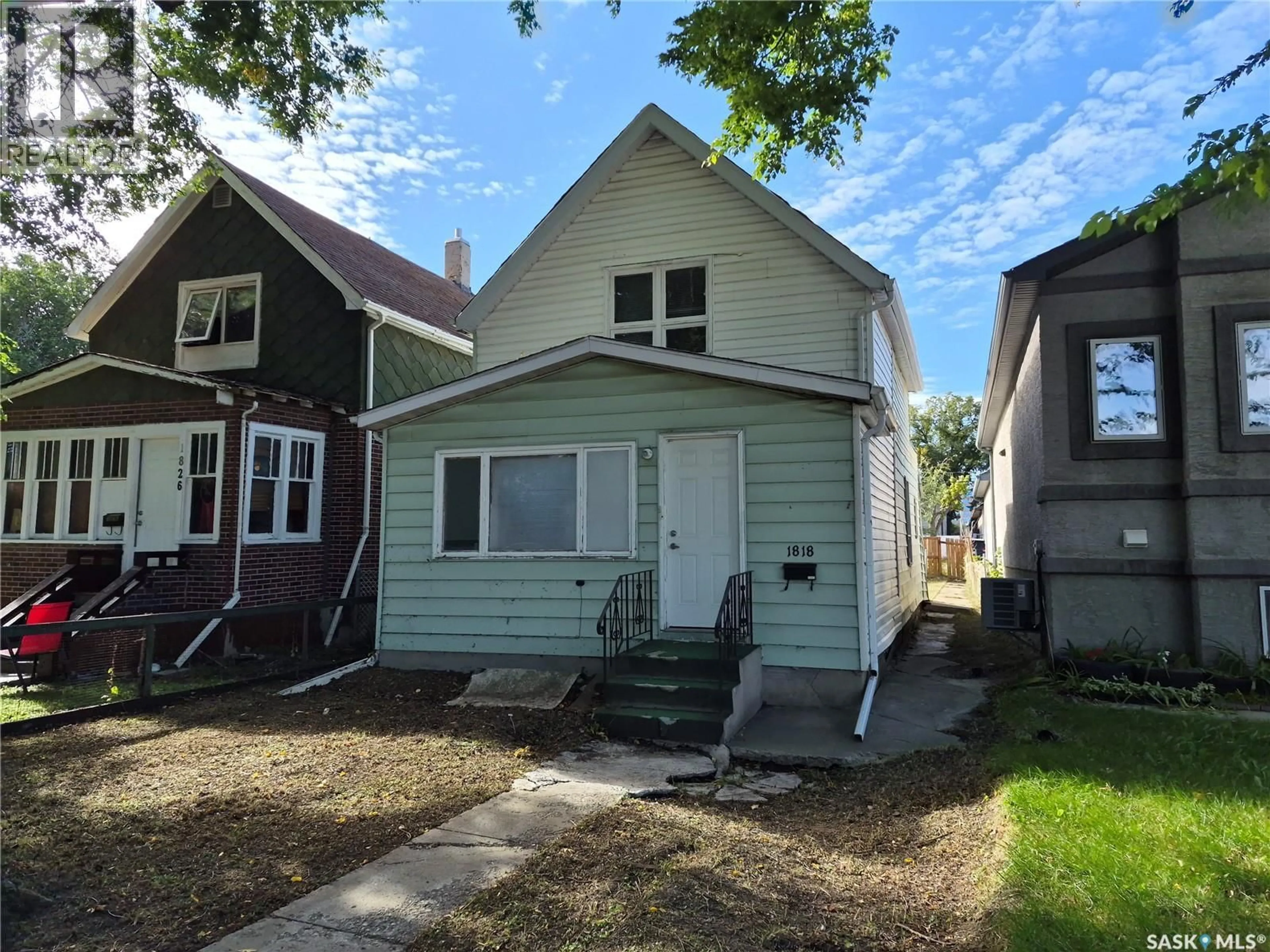 Home with vinyl exterior material, street for 1818 OTTAWA STREET, Regina Saskatchewan S4P1P4