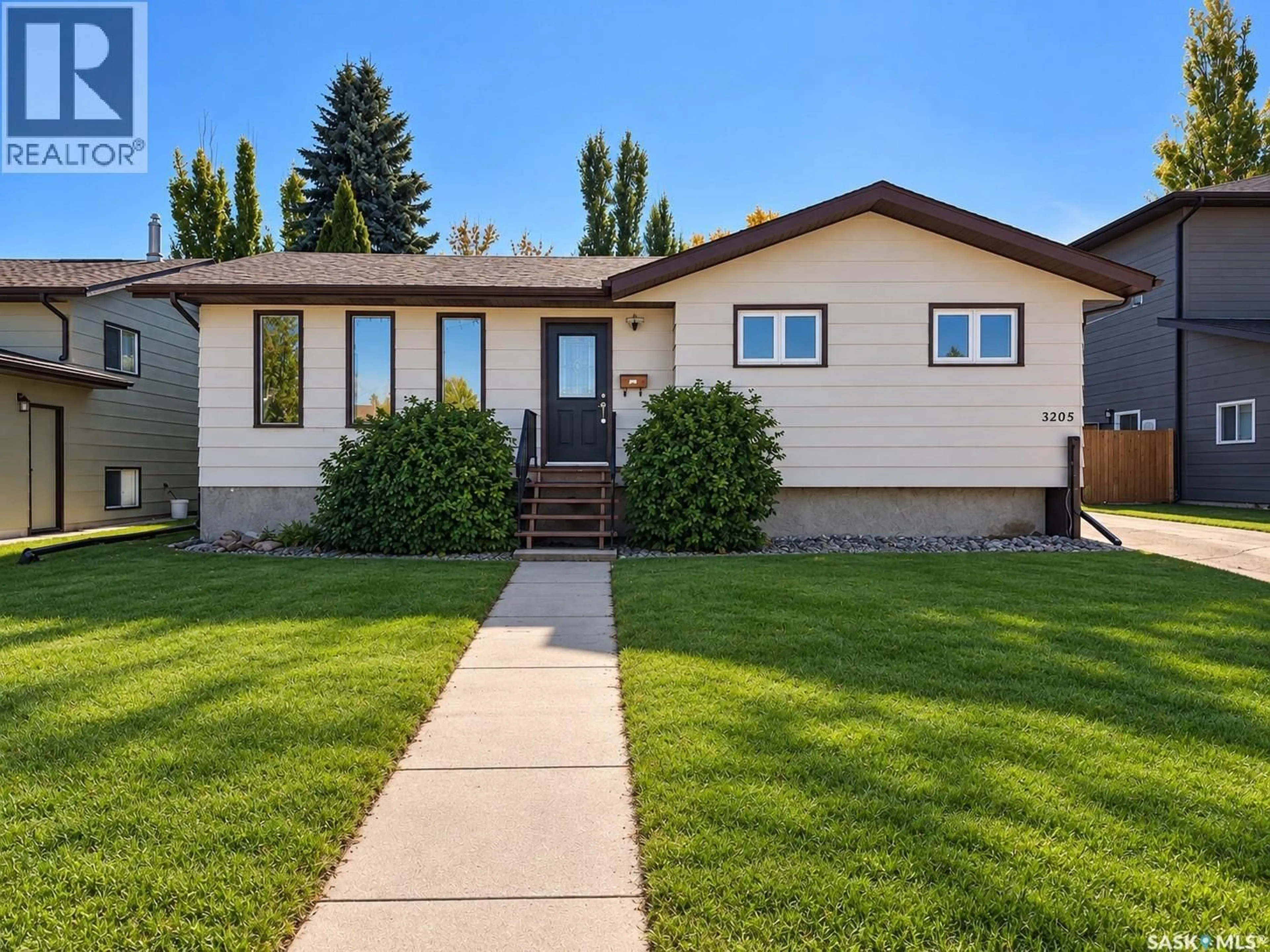 Home with vinyl exterior material, street for 3205 BLISS CRESCENT, Prince Albert Saskatchewan S6V7M1