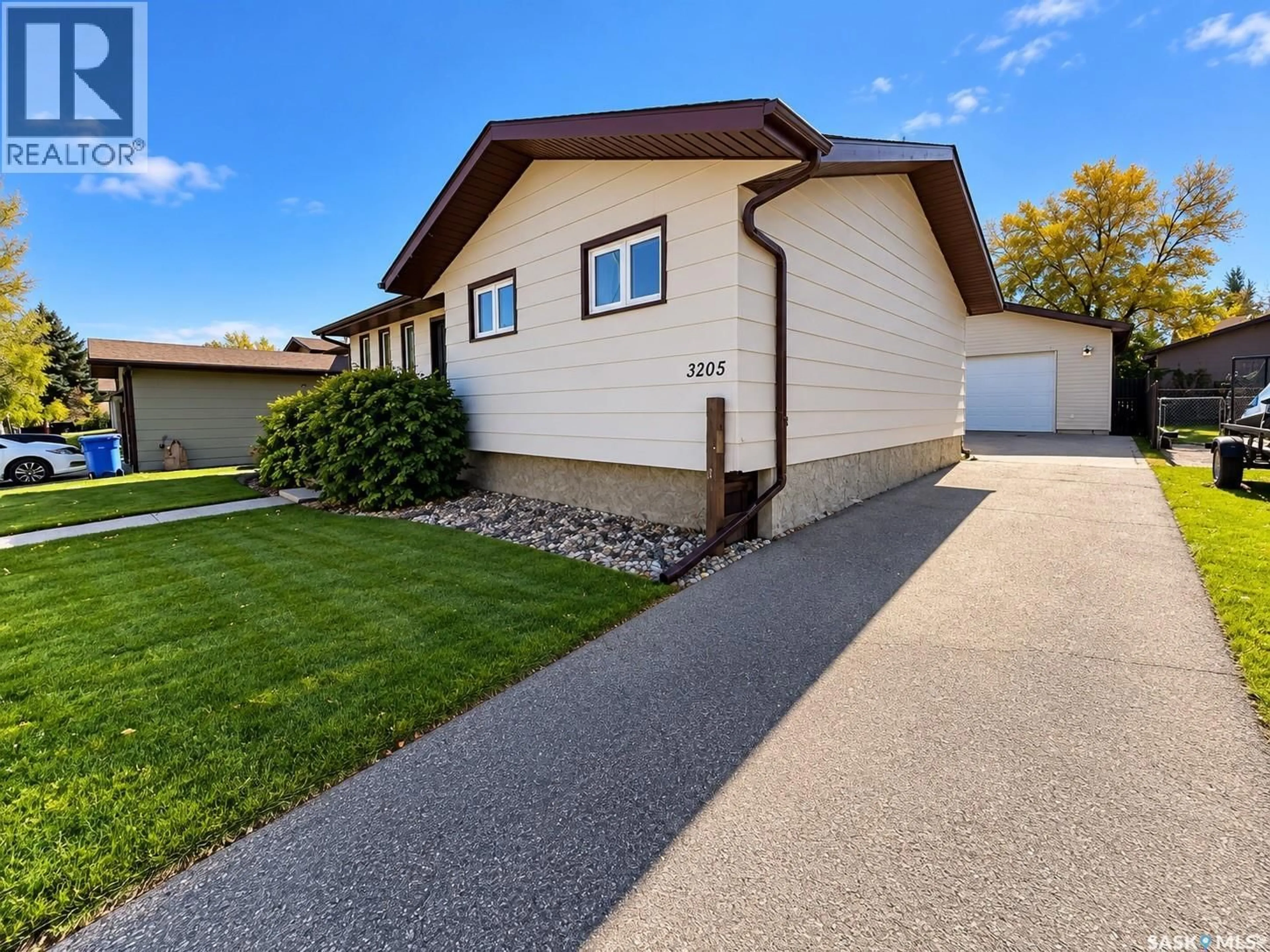 Home with vinyl exterior material, street for 3205 BLISS CRESCENT, Prince Albert Saskatchewan S6V7M1