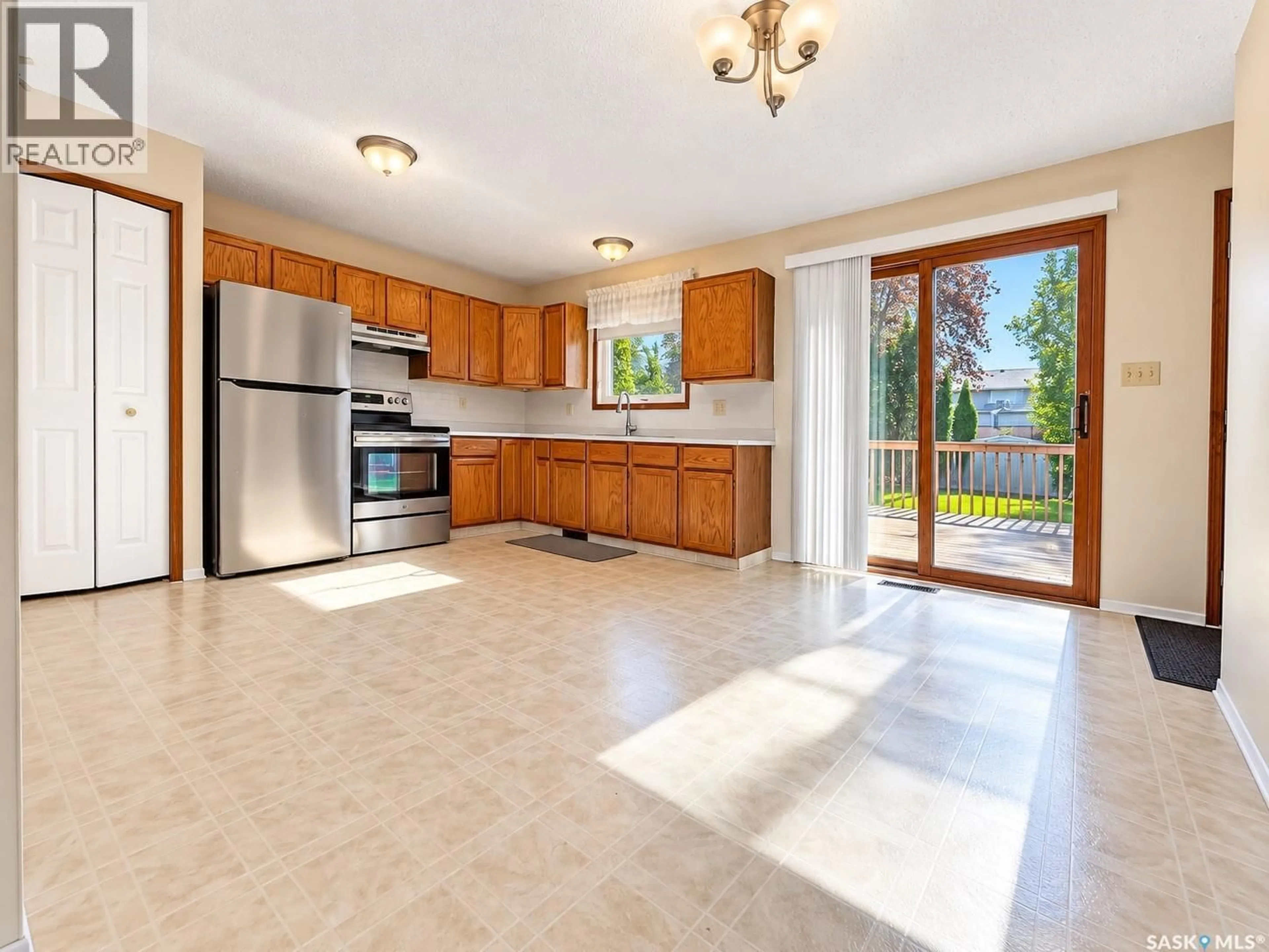 Open concept kitchen, ceramic/tile floor for 3205 BLISS CRESCENT, Prince Albert Saskatchewan S6V7M1