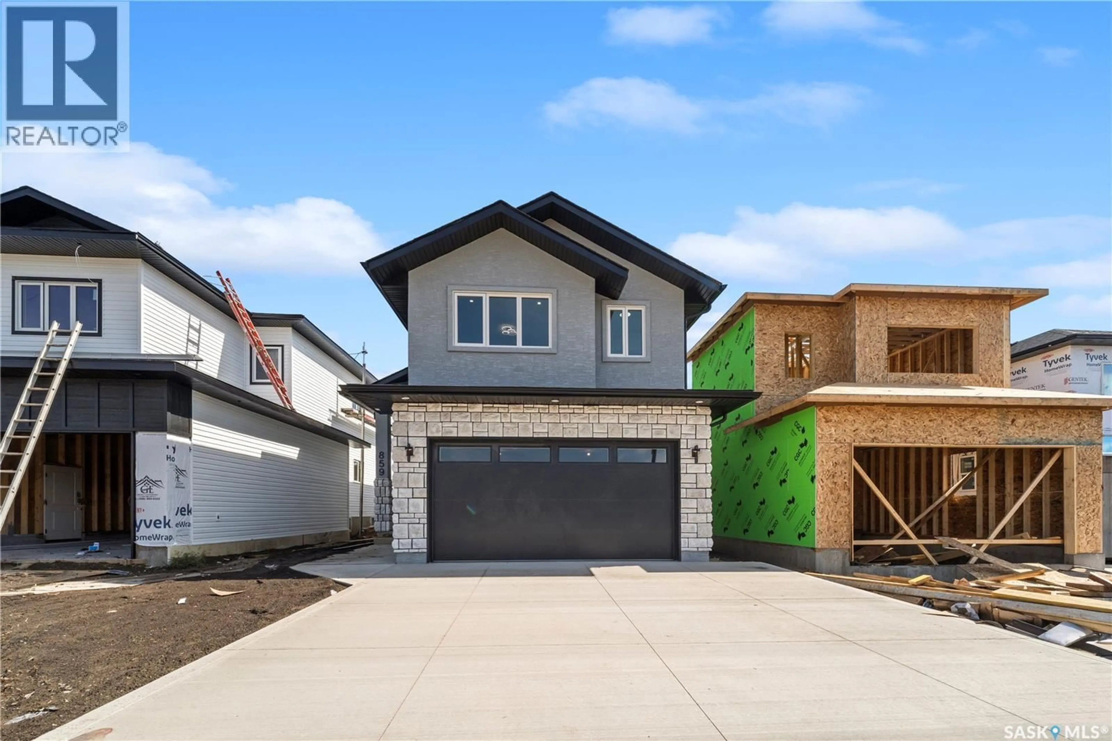 Home with vinyl exterior material, street for 859 NIGHTINGALE ROAD, Saskatoon Saskatchewan S7L7R5