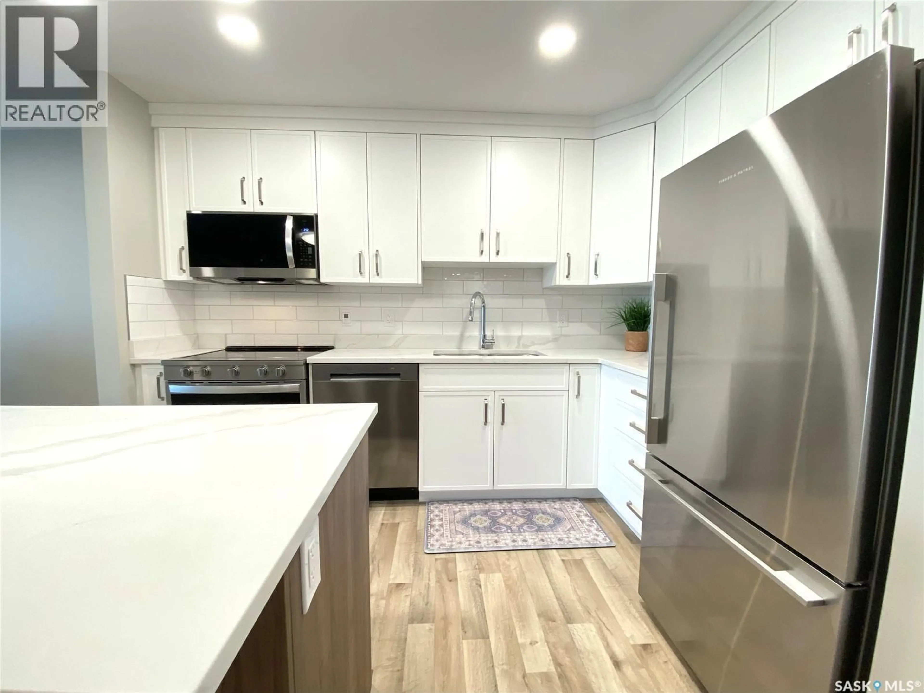 Open concept kitchen, unknown for 105 - 318 108TH STREET, Saskatoon Saskatchewan S7N1P8
