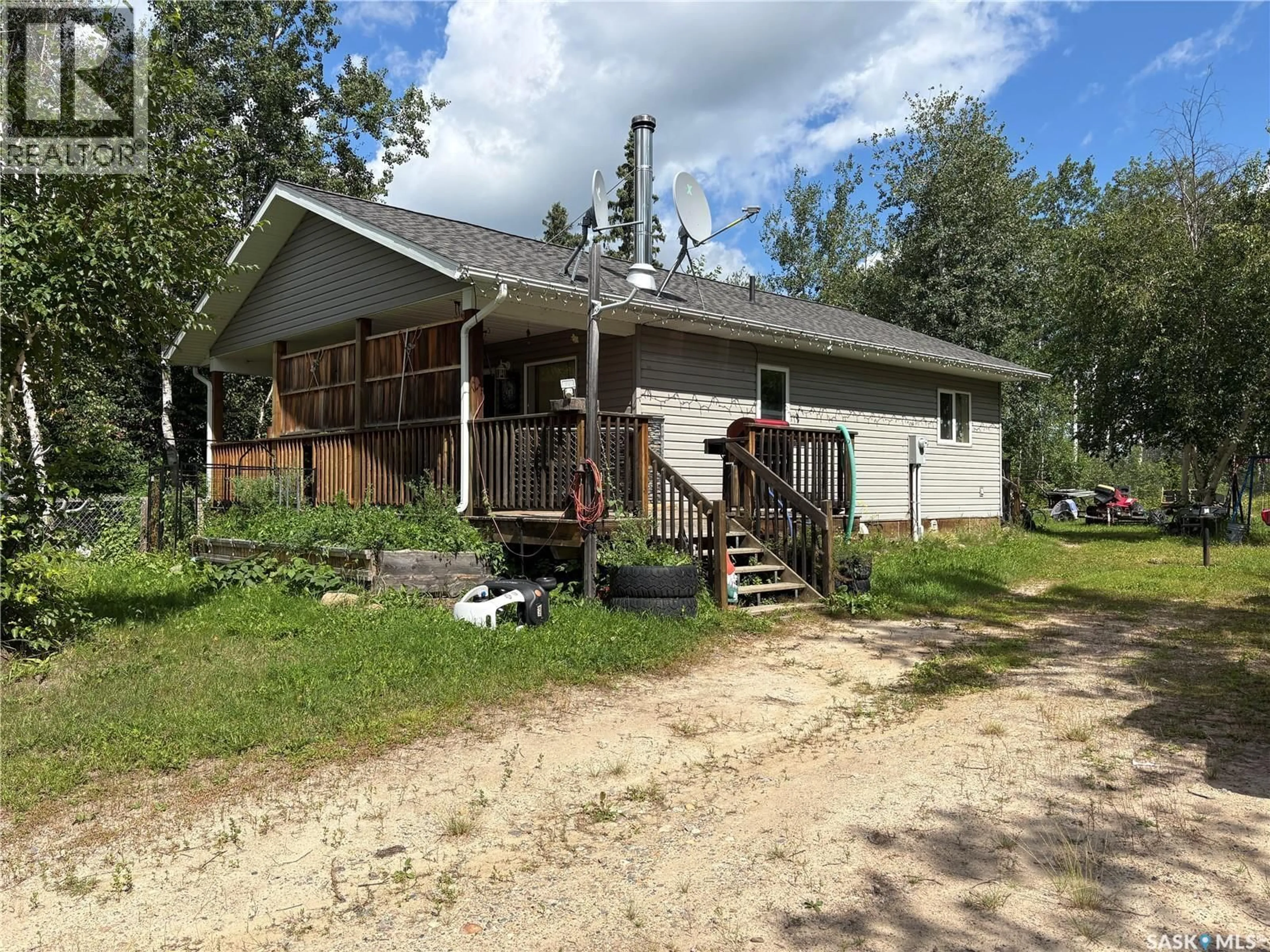 A pic from outside/outdoor area/front of a property/back of a property/a pic from drone, unknown for 5 ANDREWS WAY, Cowan Lake Saskatchewan S0J0E0