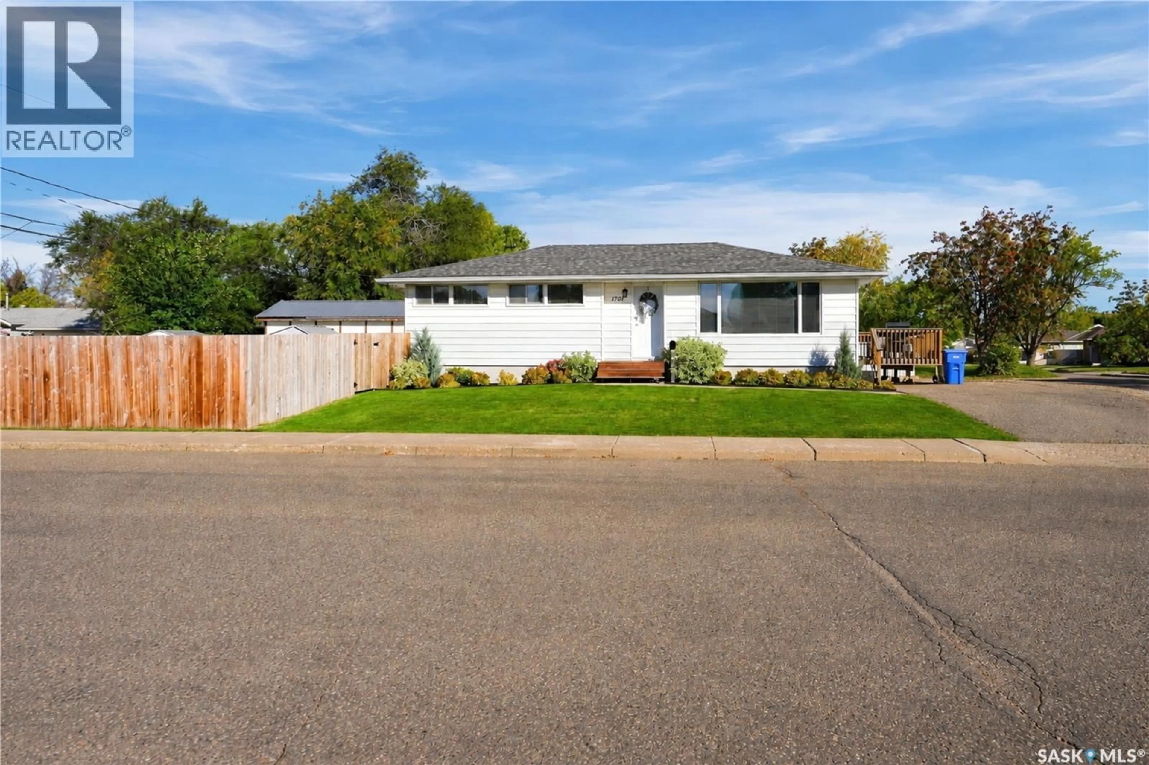 Home with vinyl exterior material, street for 1701 92ND STREET, North Battleford Saskatchewan S9A0B3