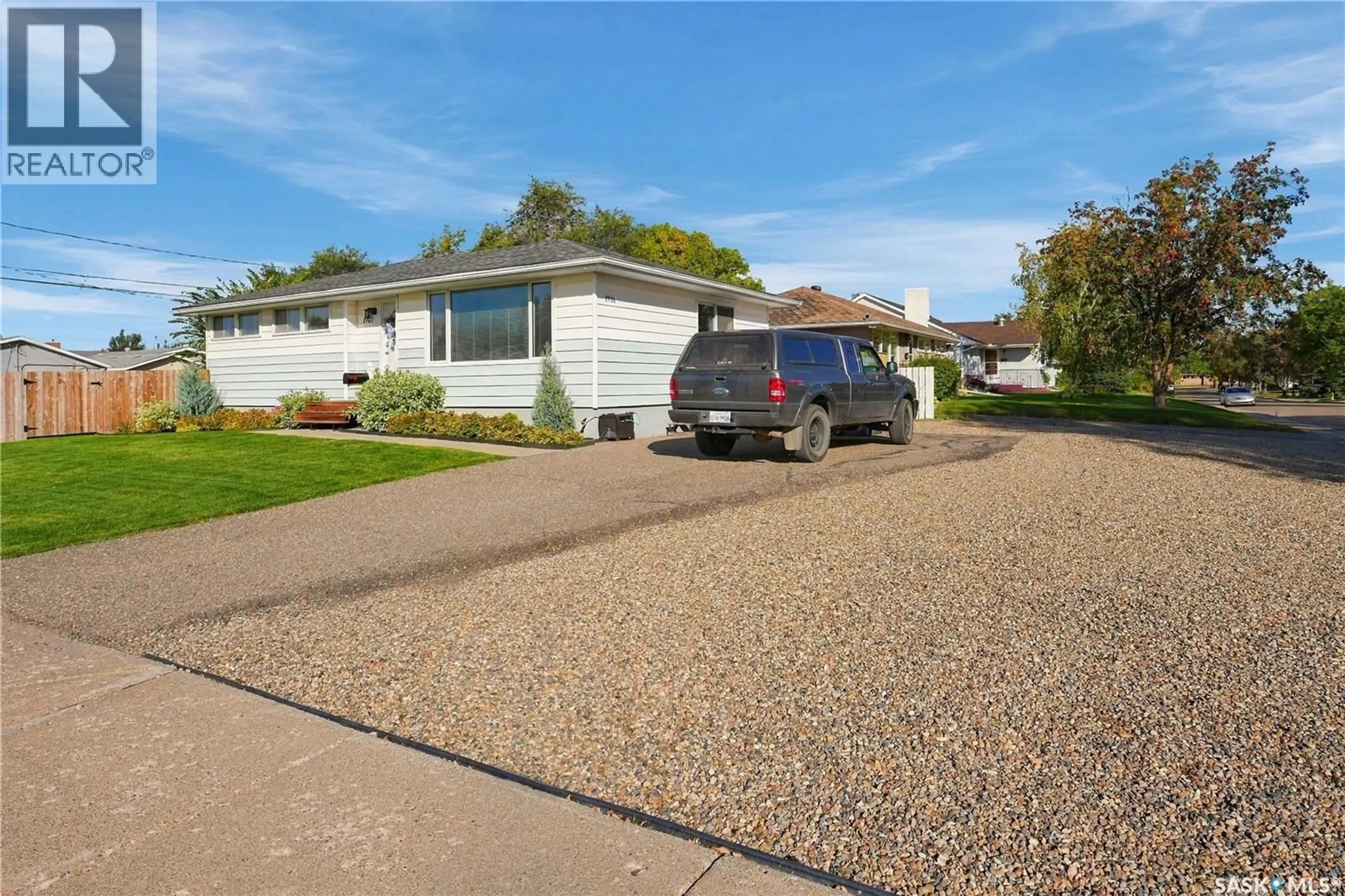 Home with vinyl exterior material, street for 1701 92ND STREET, North Battleford Saskatchewan S9A0B3