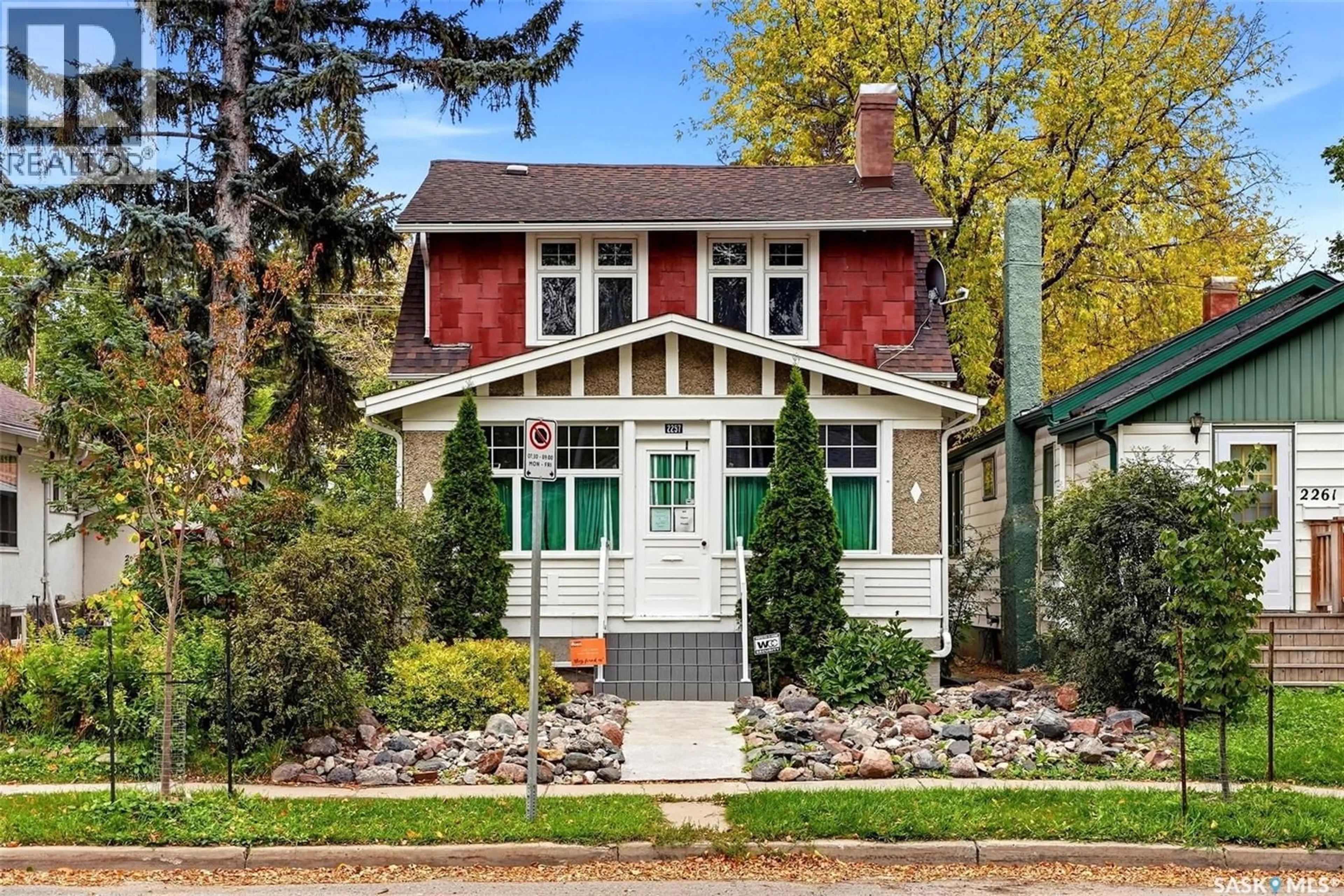 Home with vinyl exterior material, street for 2257 ELPHINSTONE STREET, Regina Saskatchewan S4T3N9