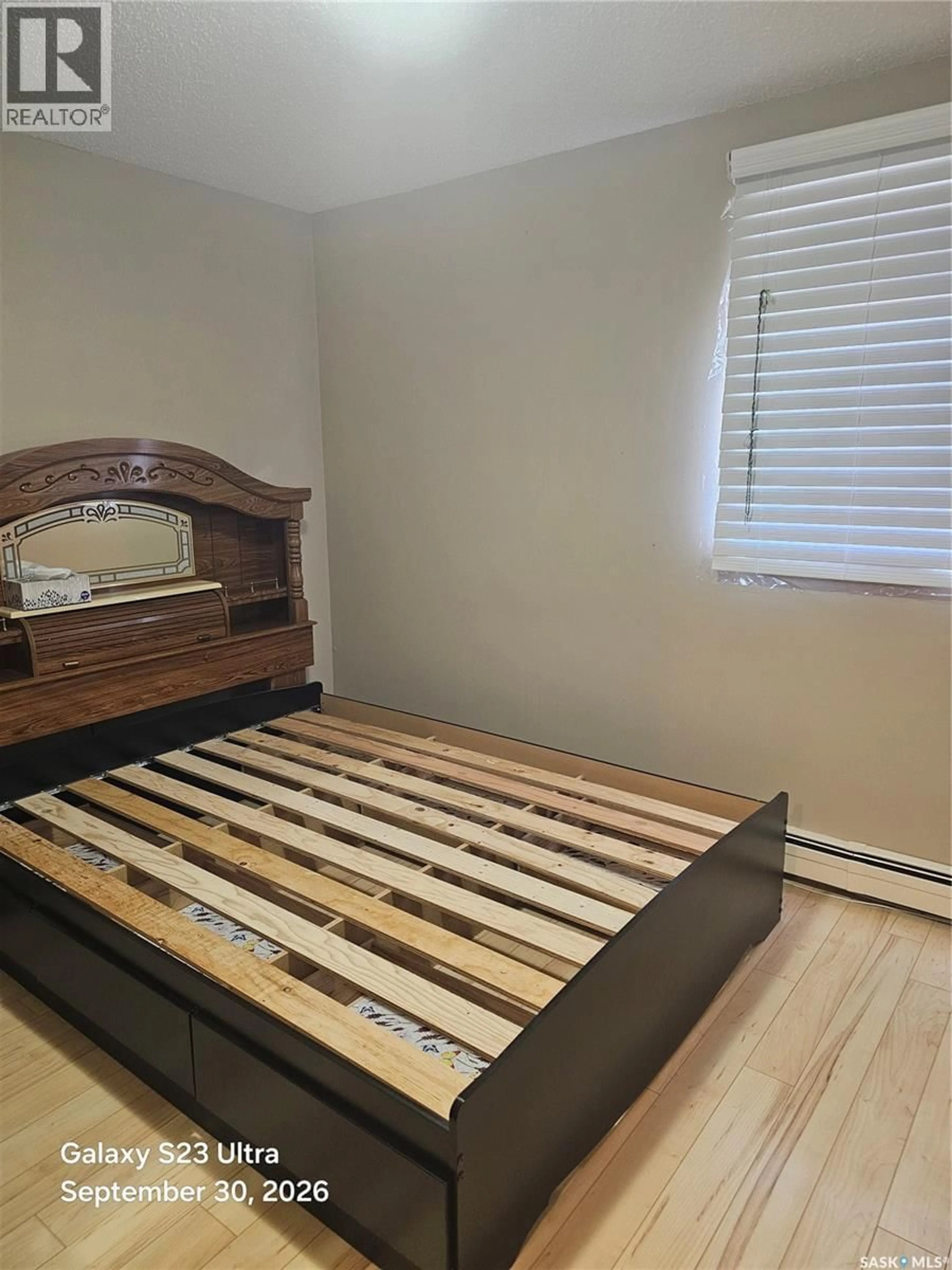 Bedroom with bed, floor is not visible for A - 201 8TH STREET, Saskatoon Saskatchewan S7H5L4
