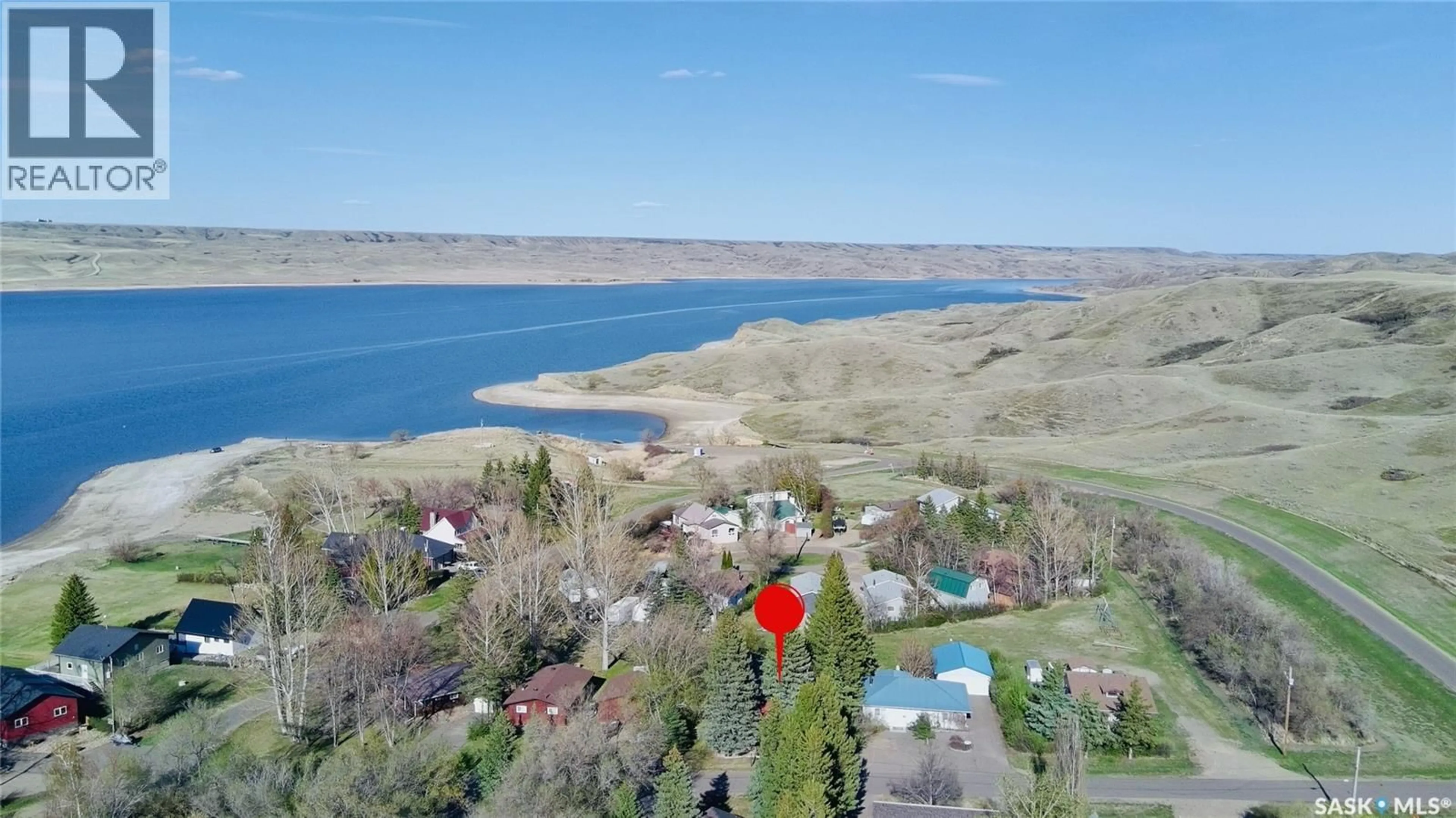 A pic from outside/outdoor area/front of a property/back of a property/a pic from drone, water/lake/river/ocean view for 105 OTTER CRESCENT, Beaver Flat Saskatchewan S0N2P0