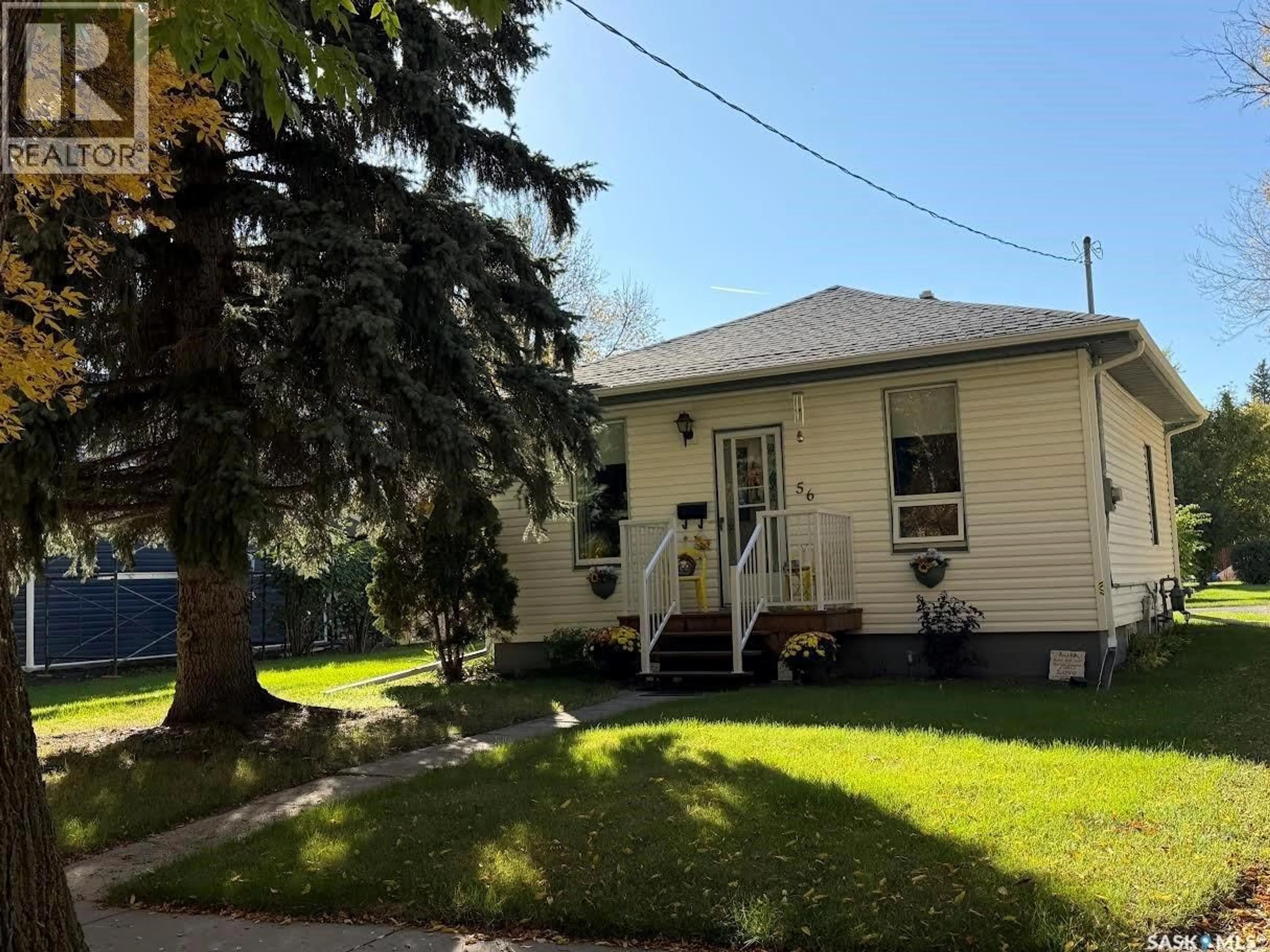 Home with vinyl exterior material, street for 56 HAULTAIN AVENUE, Yorkton Saskatchewan S3N1X7