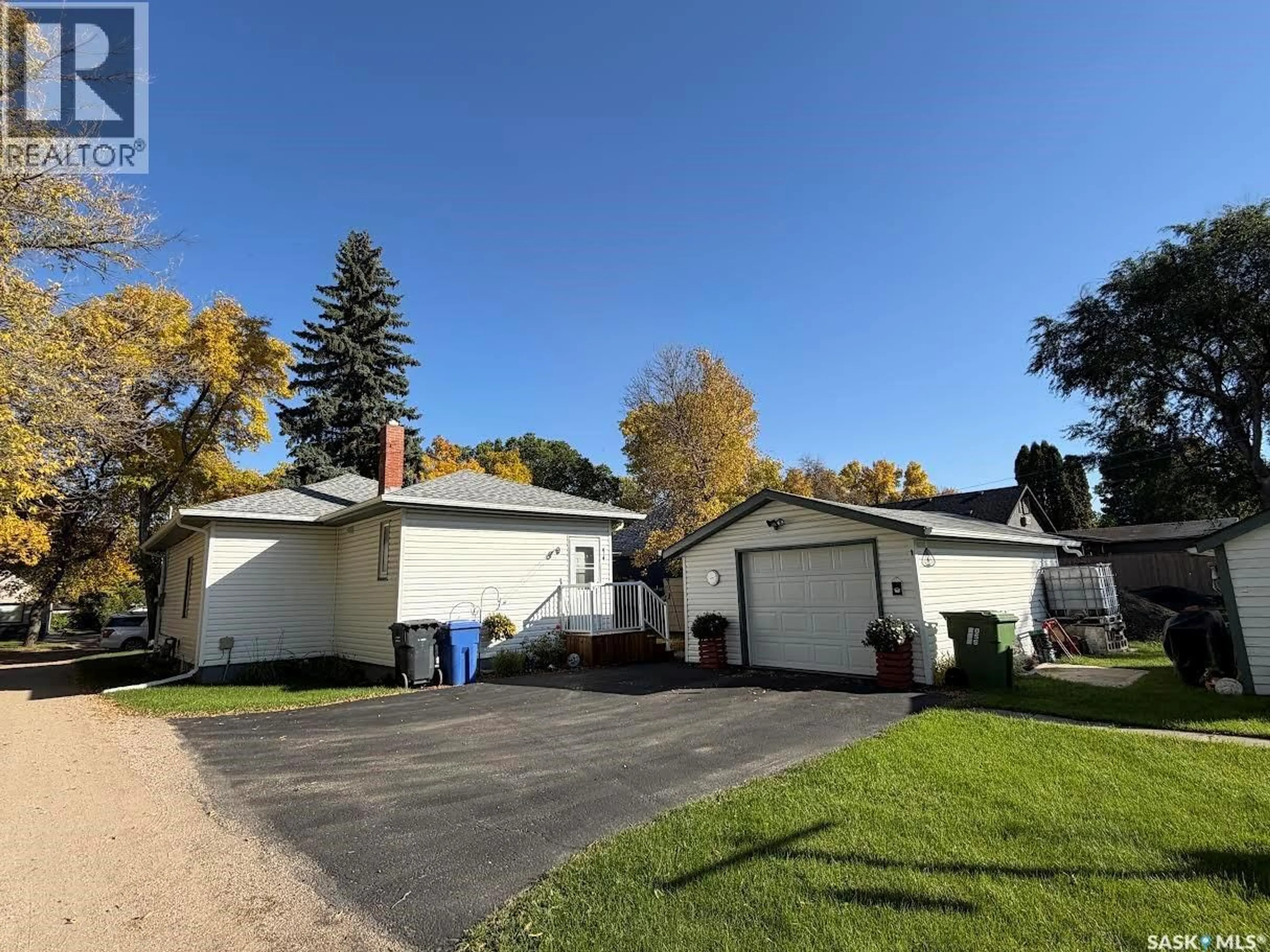 A pic from outside/outdoor area/front of a property/back of a property/a pic from drone, street for 56 HAULTAIN AVENUE, Yorkton Saskatchewan S3N1X7