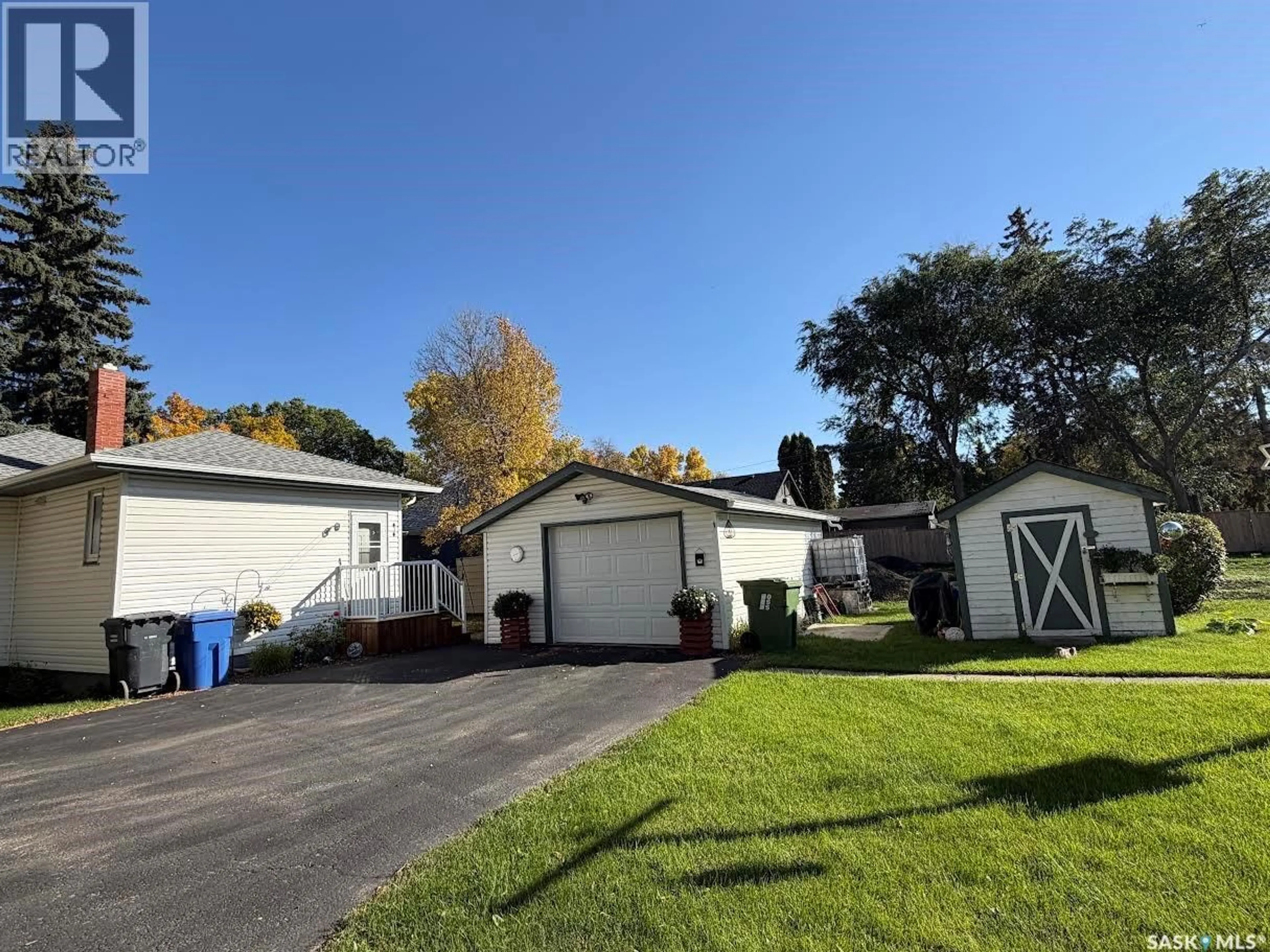 A pic from outside/outdoor area/front of a property/back of a property/a pic from drone, street for 56 HAULTAIN AVENUE, Yorkton Saskatchewan S3N1X7