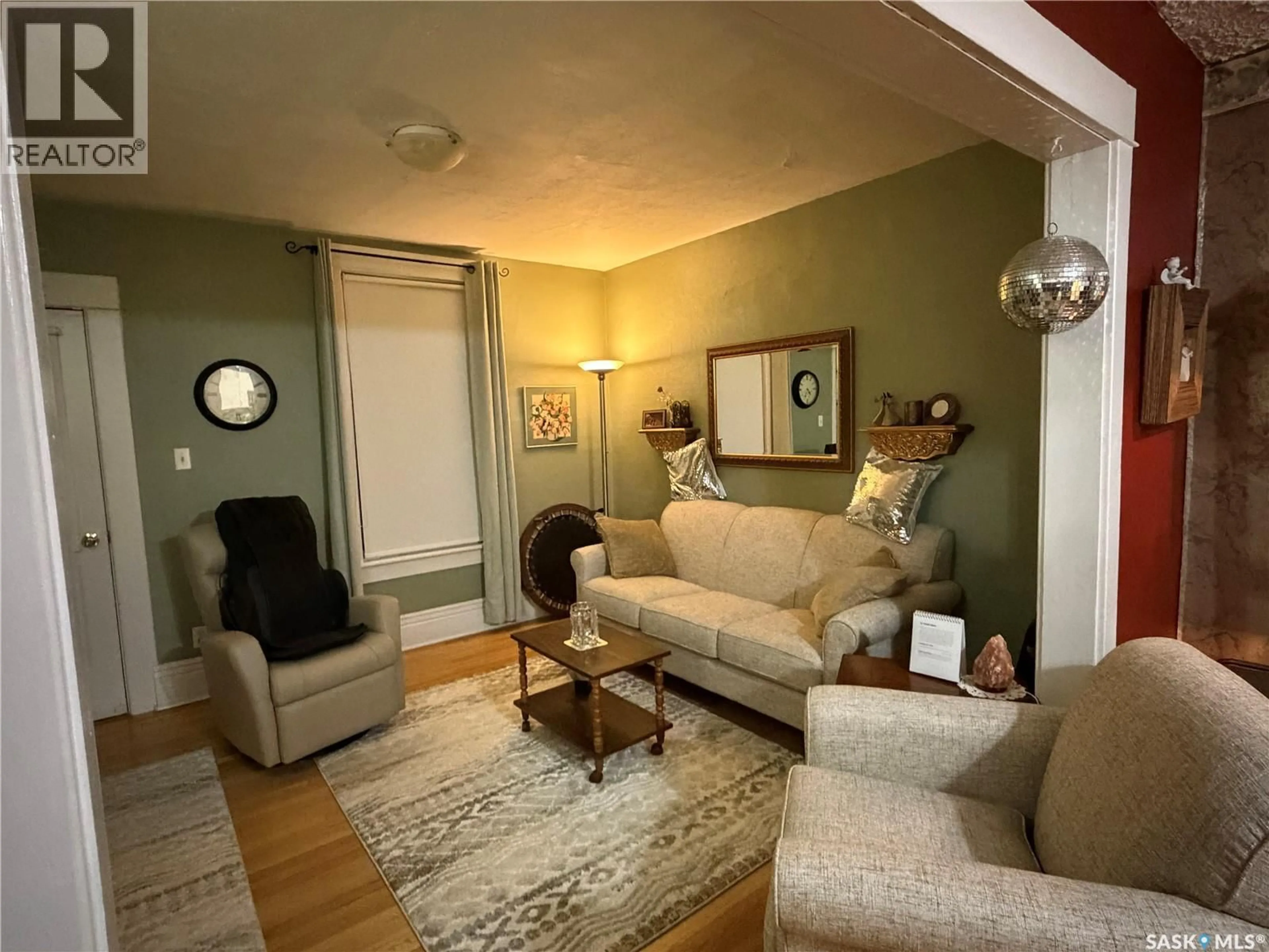 Living room with furniture, unknown for 56 HAULTAIN AVENUE, Yorkton Saskatchewan S3N1X7