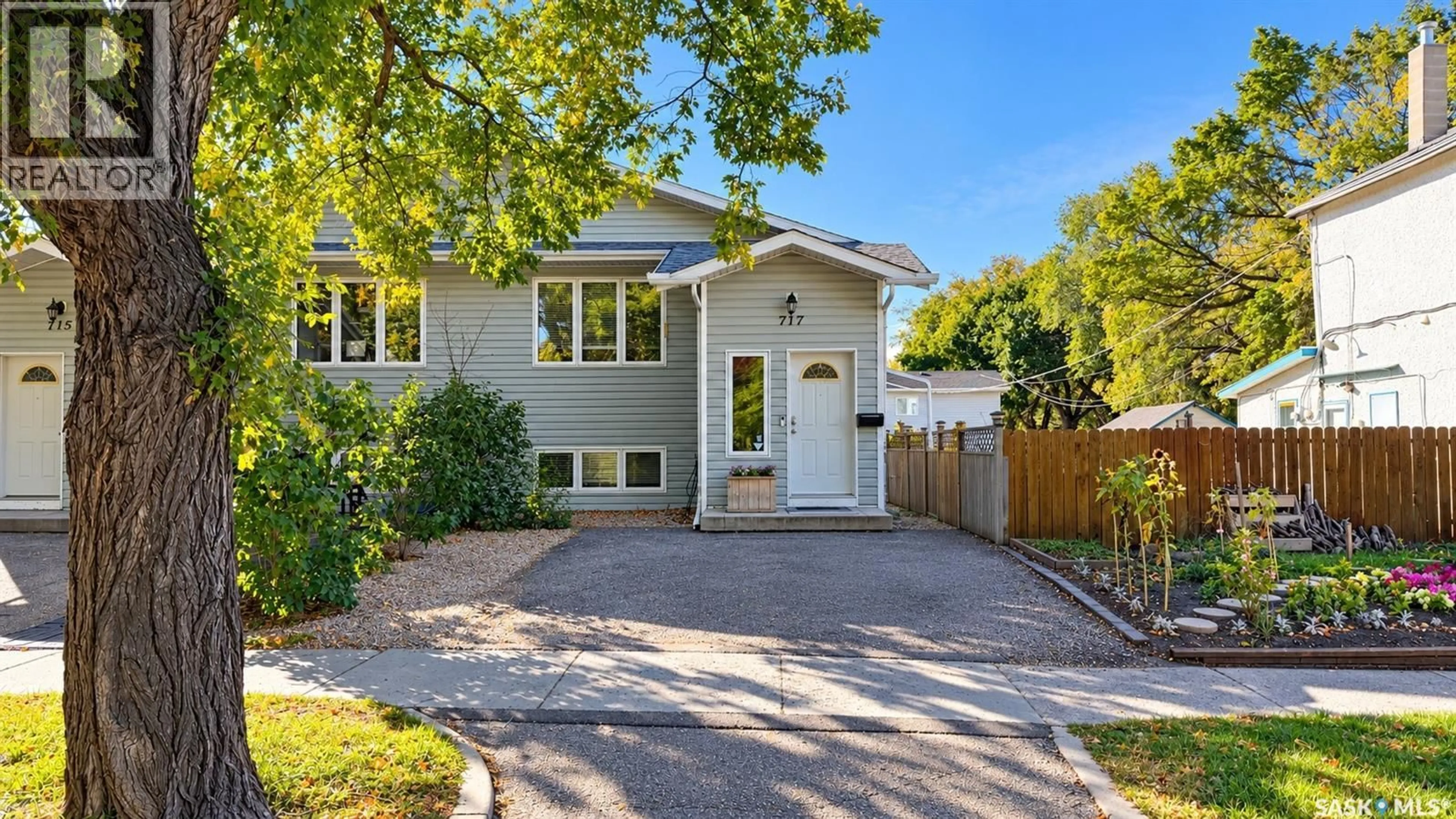 Home with vinyl exterior material, street for 717 31ST STREET, Saskatoon Saskatchewan S7L0R5