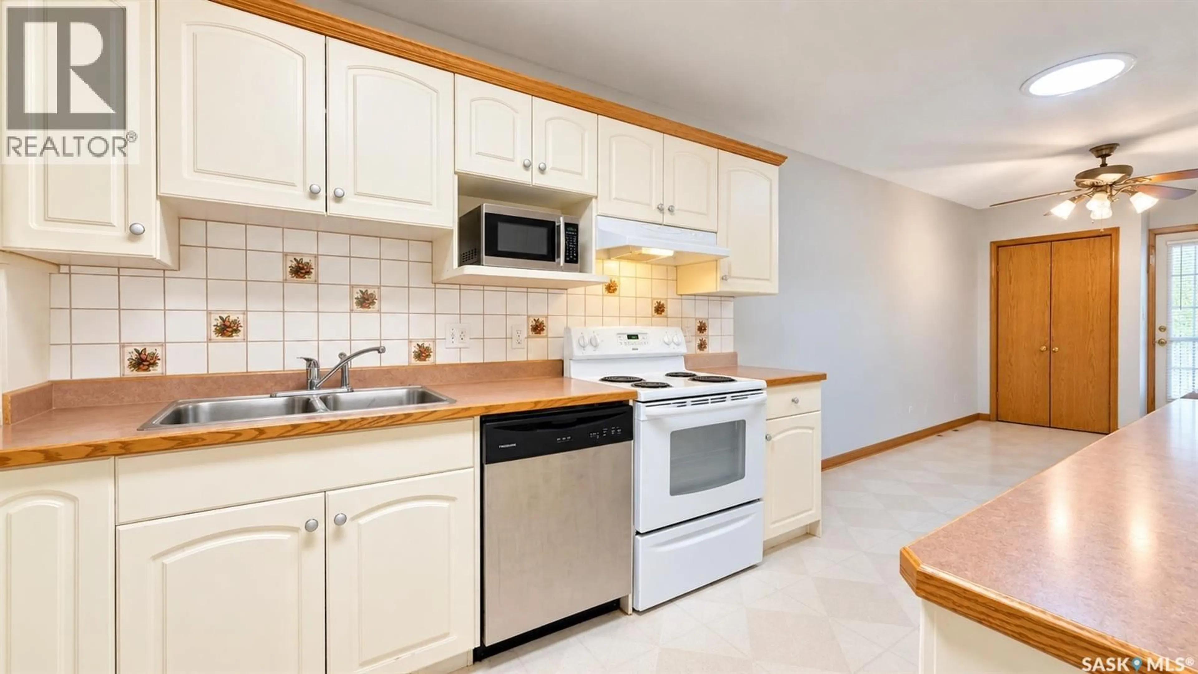 Standard kitchen, ceramic/tile floor for 717 31ST STREET, Saskatoon Saskatchewan S7L0R5
