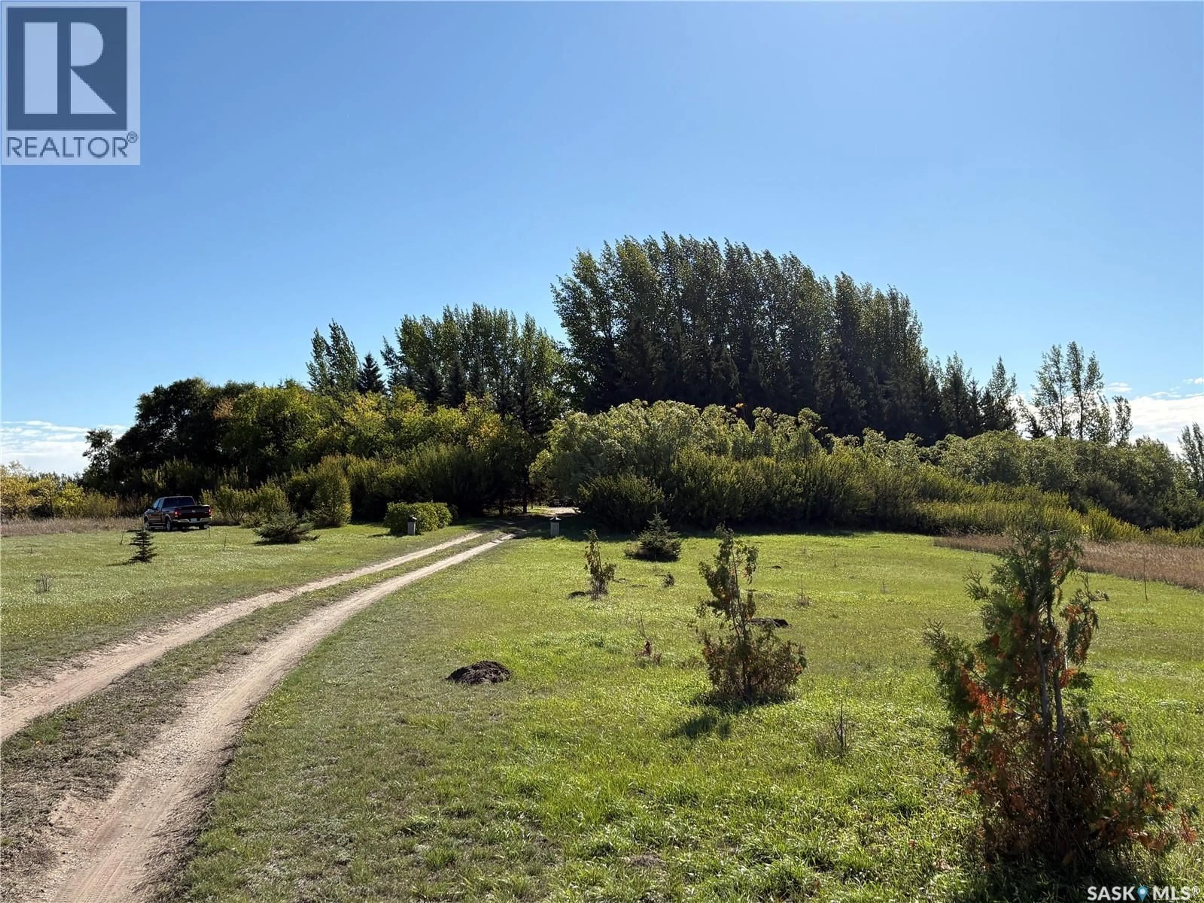 A pic from outside/outdoor area/front of a property/back of a property/a pic from drone, forest/trees view for 34059 RGE RD 3074 ACREAGE, Vanscoy Rm No. 345 Saskatchewan S7K1N2
