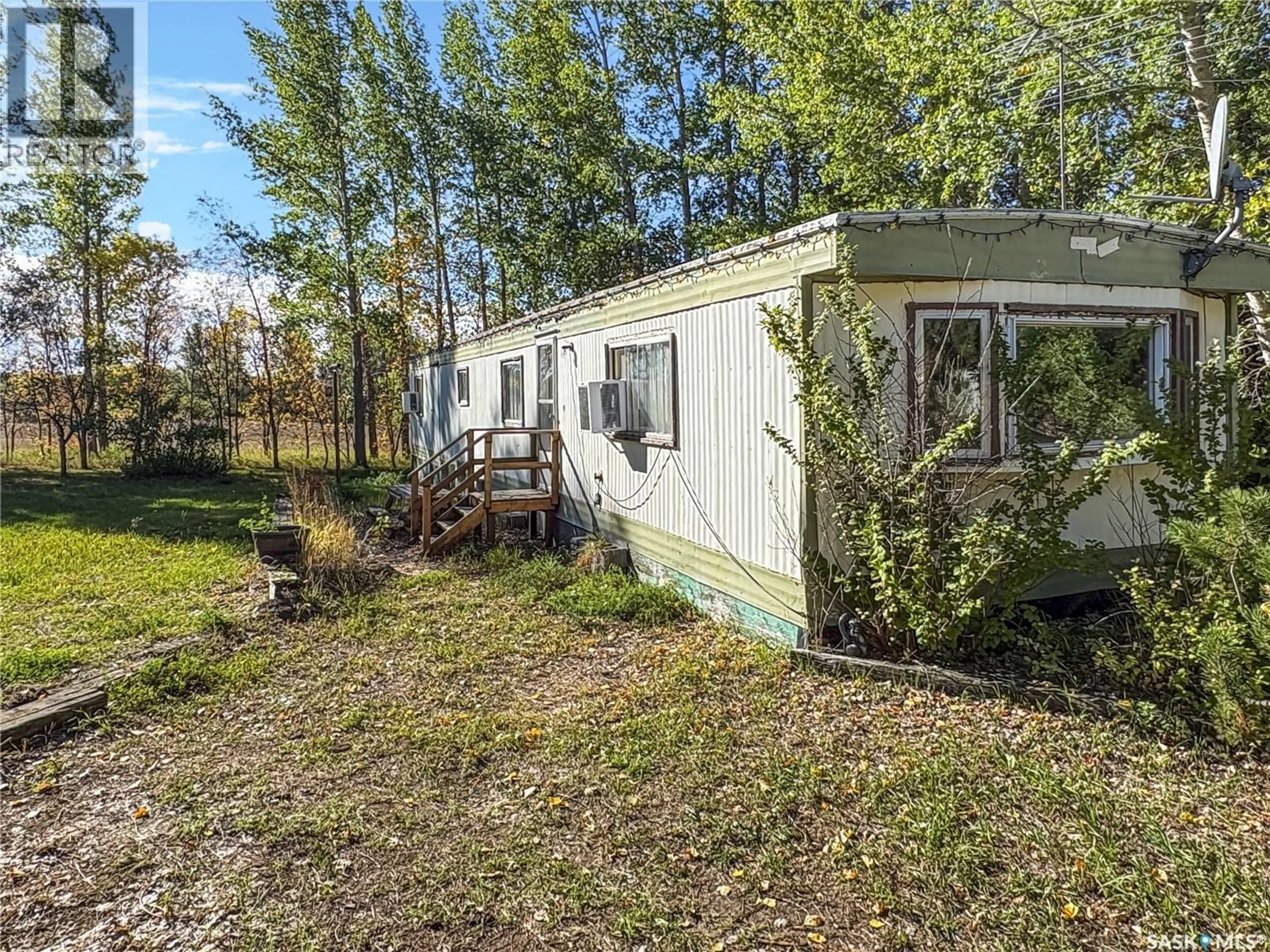 A pic from outside/outdoor area/front of a property/back of a property/a pic from drone, forest/trees view for 34059 RGE RD 3074 ACREAGE, Vanscoy Rm No. 345 Saskatchewan S7K1N2