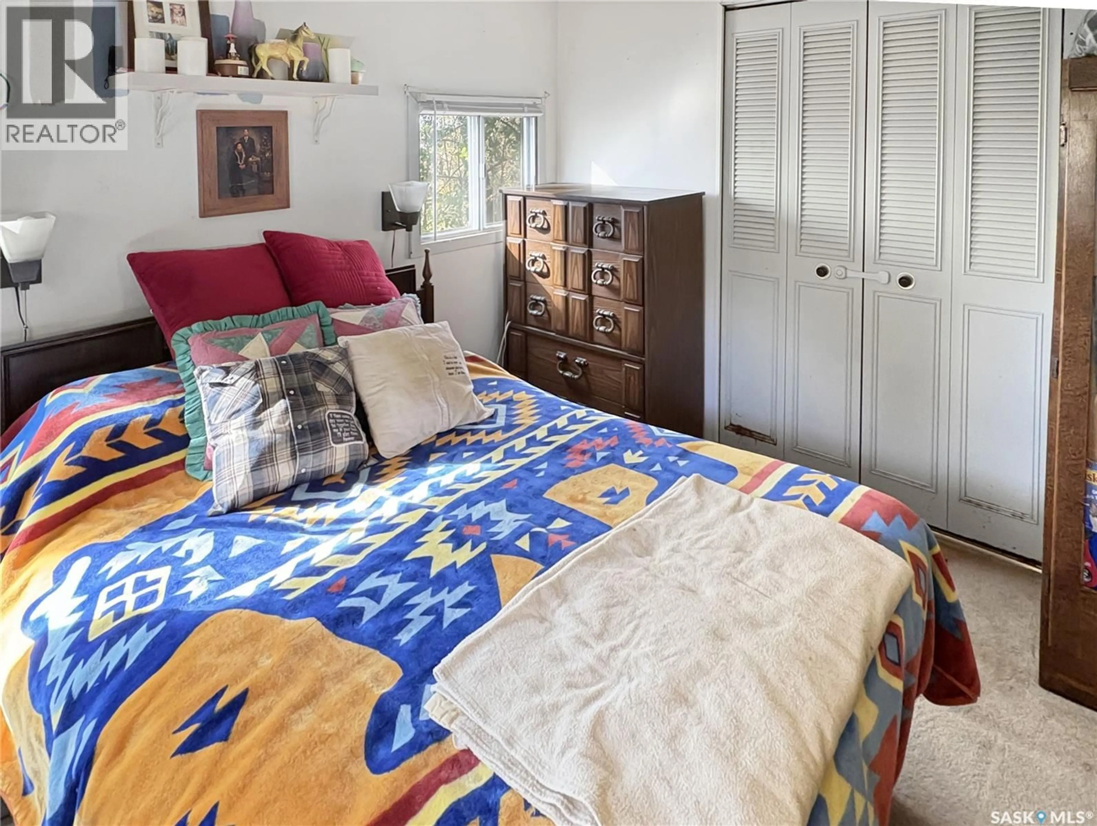 Bedroom with bed, unknown for 34059 RGE RD 3074 ACREAGE, Vanscoy Rm No. 345 Saskatchewan S7K1N2