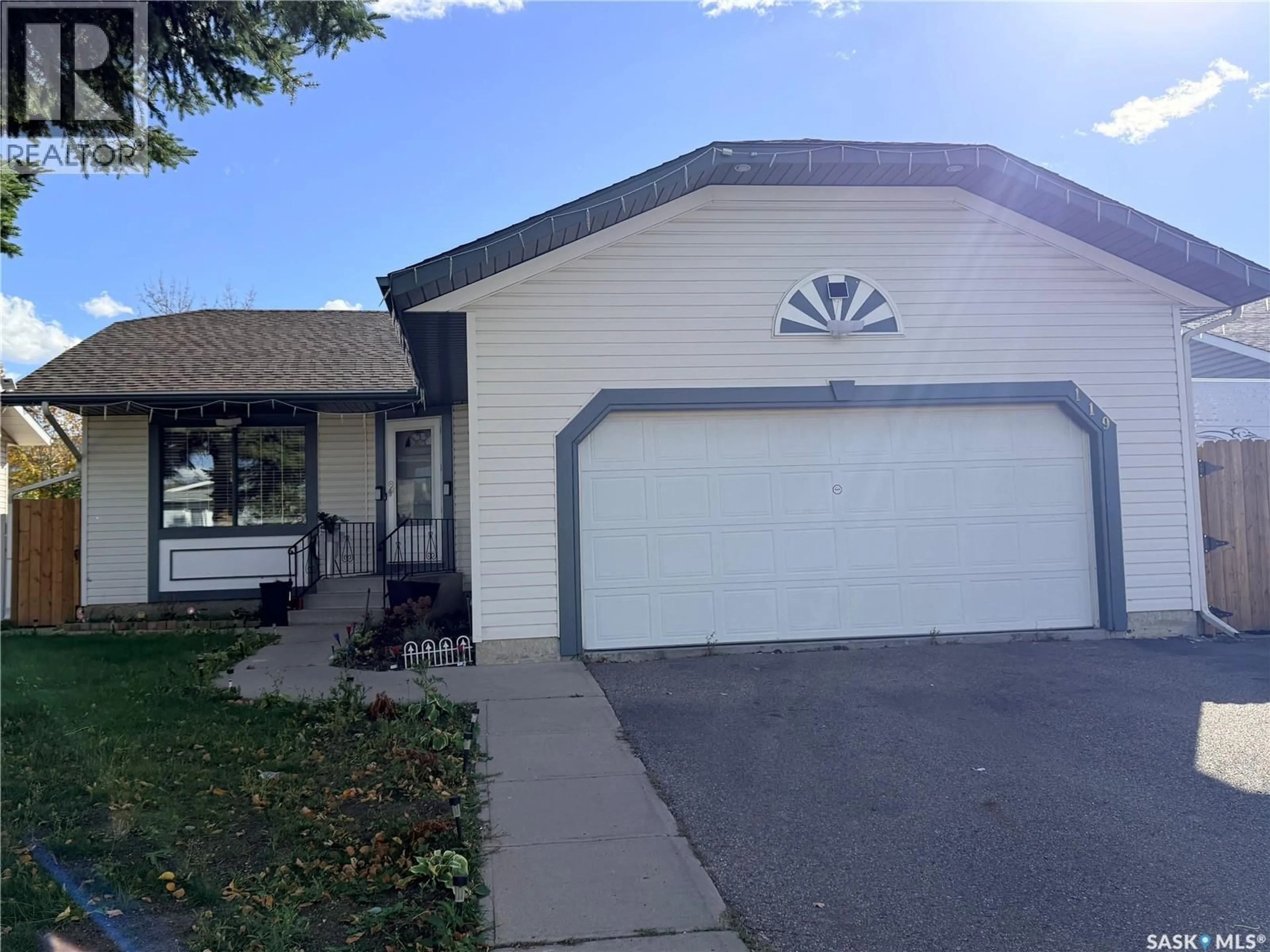Home with vinyl exterior material, street for 119 HALL CRESCENT, Saskatoon Saskatchewan S7L7G7