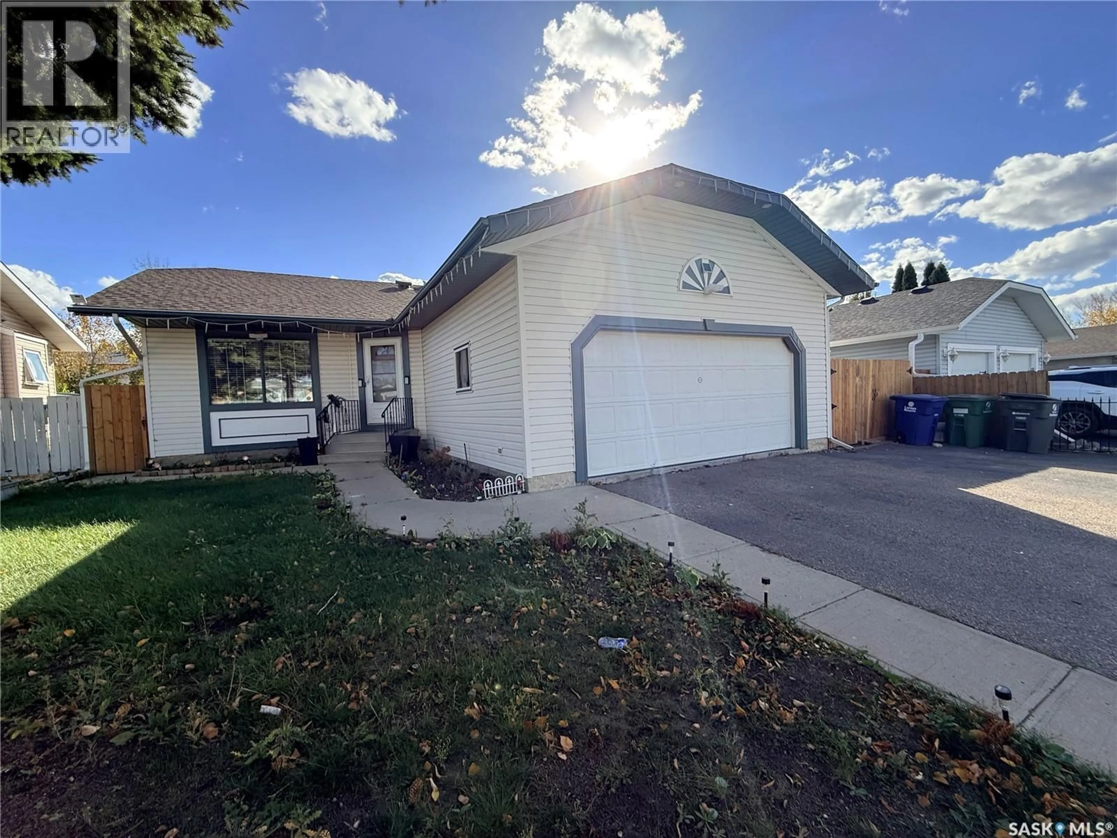 Home with vinyl exterior material, street for 119 HALL CRESCENT, Saskatoon Saskatchewan S7L7G7