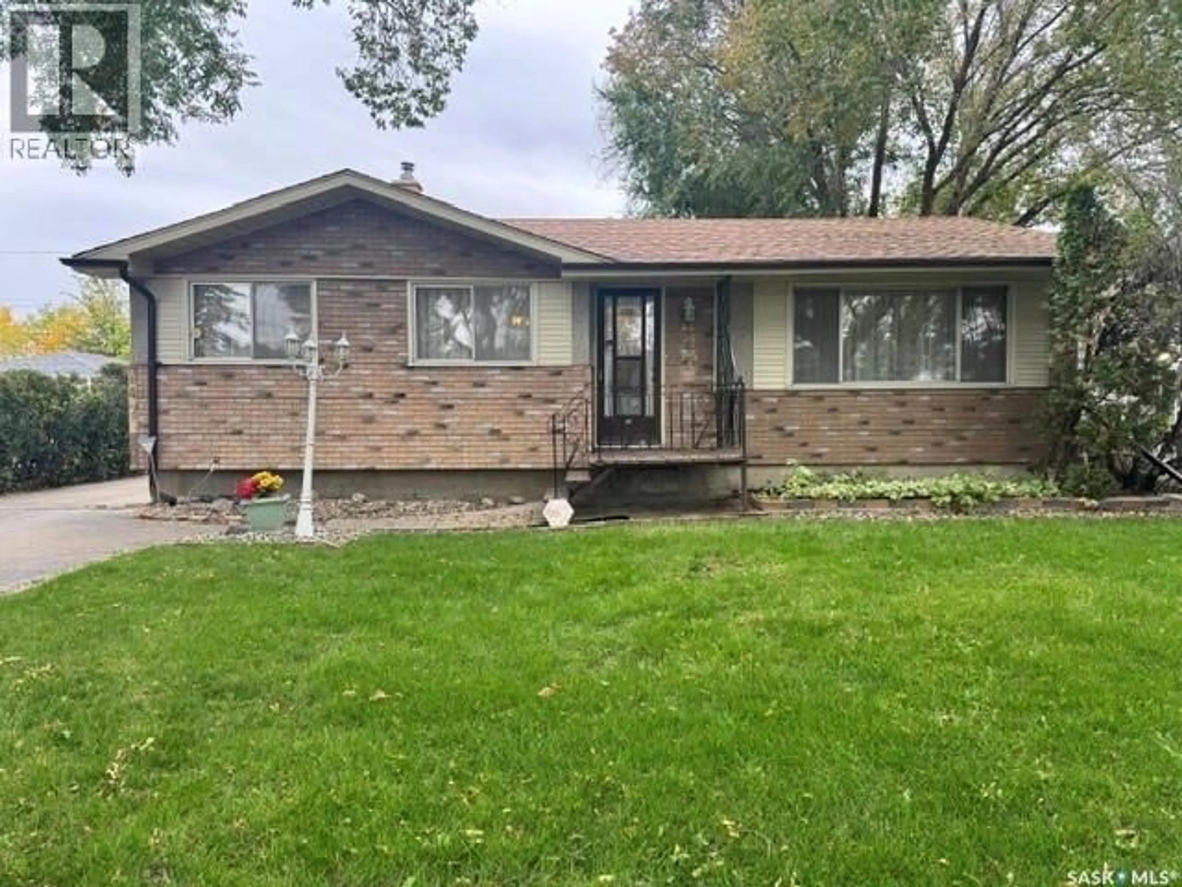 Home with brick exterior material, street for 147 WOODWARD AVENUE, Regina Saskatchewan S4R3H5