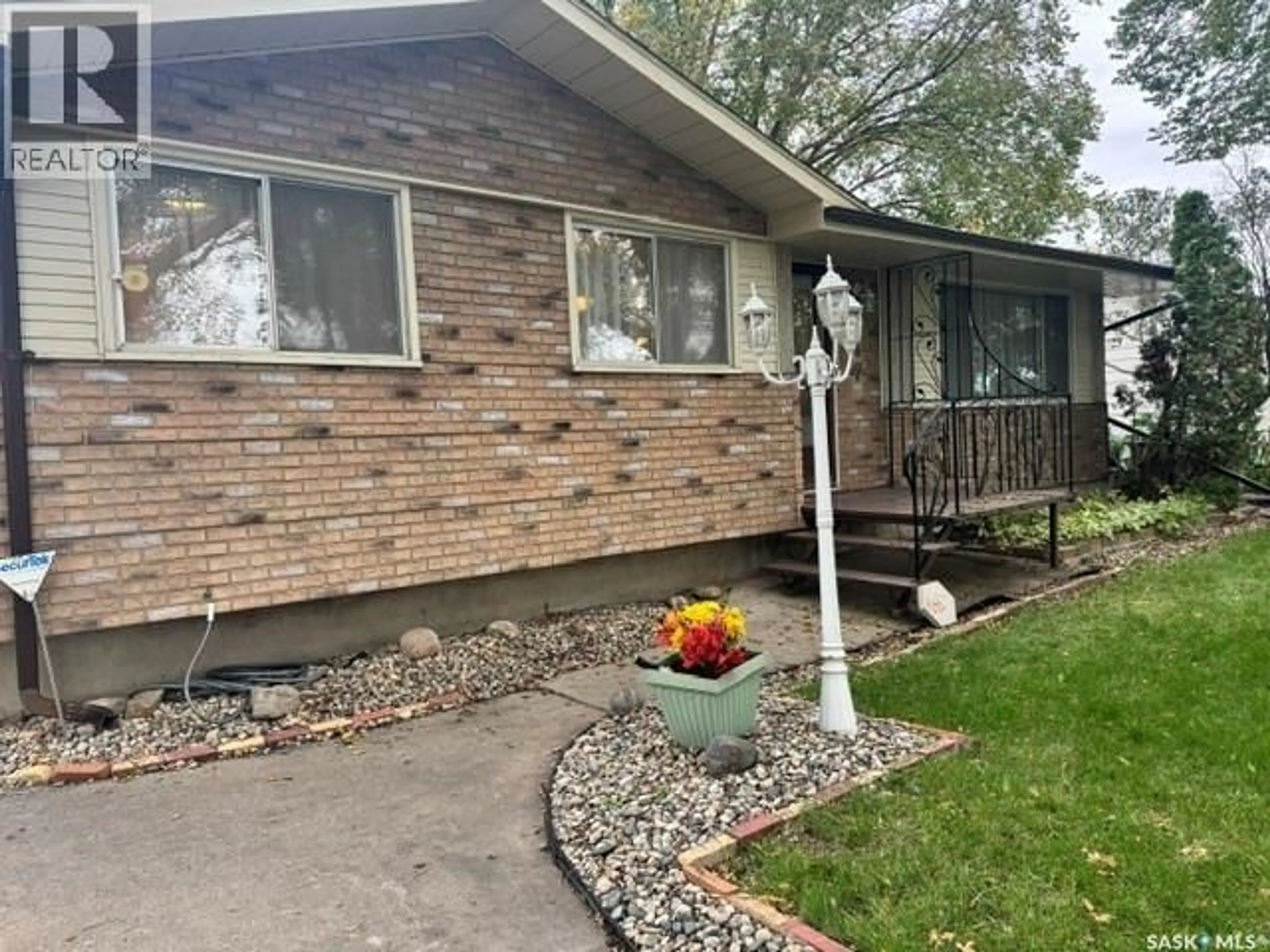 Home with brick exterior material, street for 147 WOODWARD AVENUE, Regina Saskatchewan S4R3H5