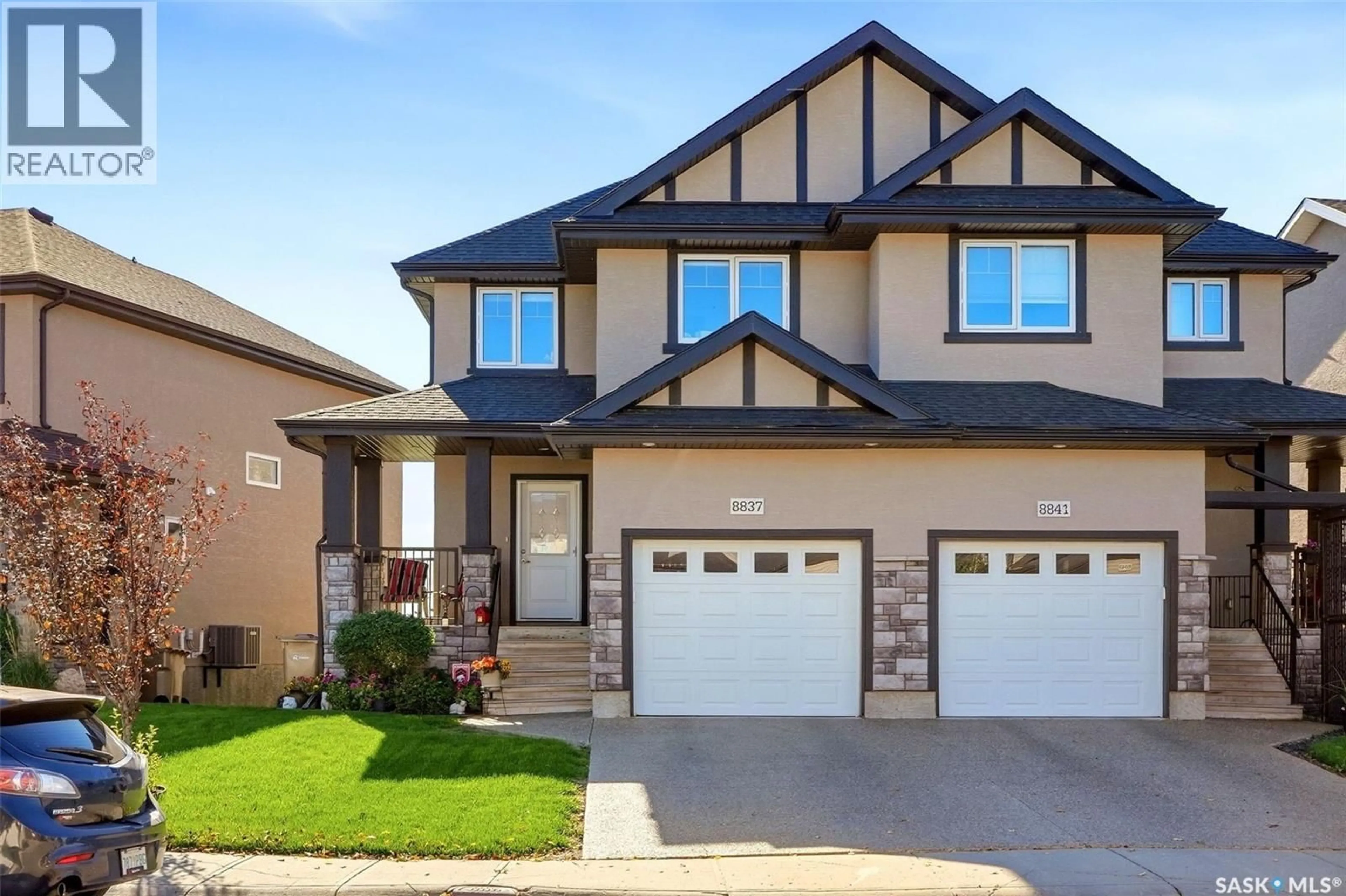 Home with vinyl exterior material, street for 8837 KESTRAL DRIVE, Regina Saskatchewan S4Y0C2